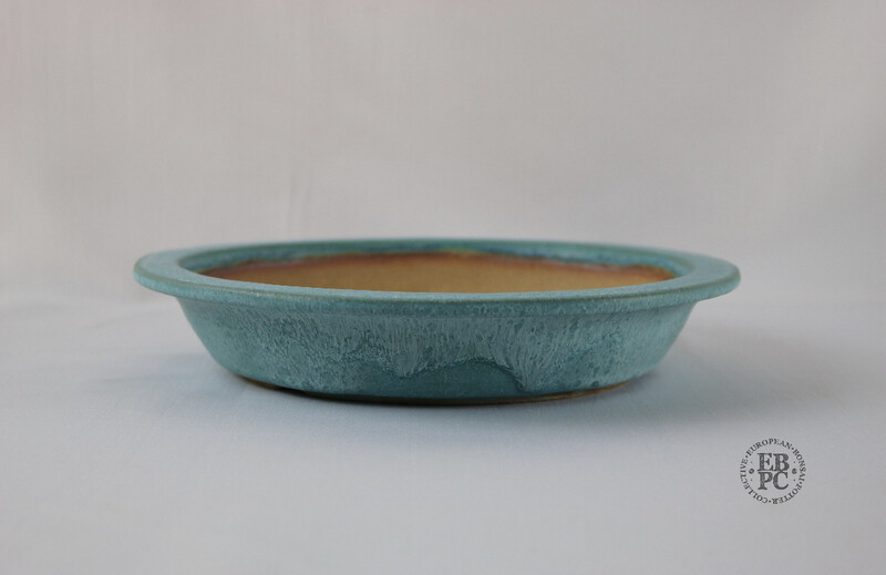 Fukurou Ceramics - Switzerland.  24.2cm; Hand-made; Refined Round; Lipped Design; Foot ring with Arch-cut Feet; Superb Drippy Glaze; White over Turquoise; Blue; Green; Patrik Lüthi