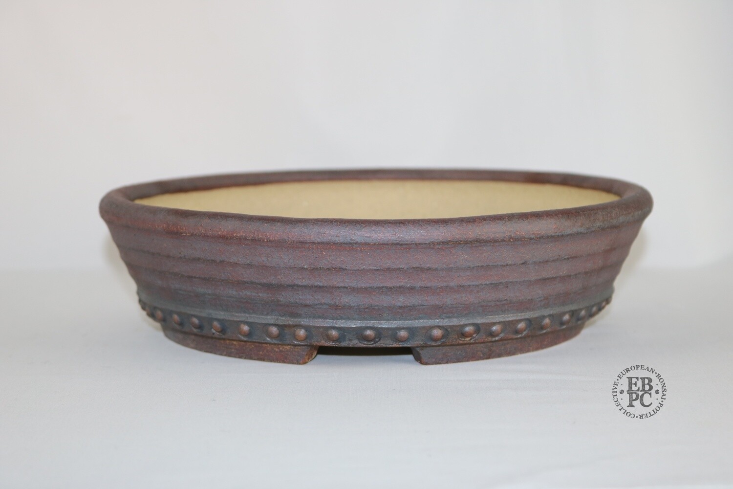 Ian Baillie - 26.1cm; Superb Form; Round; Drum Style; Studs; Unglazed; Browns; Reddish Hues; Hand-signed; Stamped - EBPC IB, &amp; Scotland.