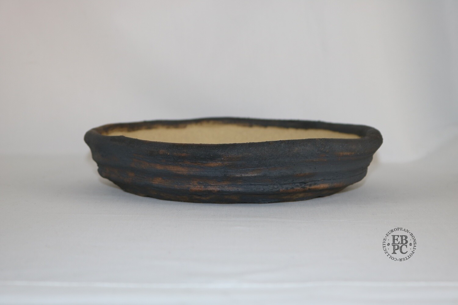 Ian Baillie - 23.6cm; Unglazed; Nanban; Ribbed Profile; Light Clay; Browns; Charcoal Grey; Rustic; Aged looking; Hand-signed; EBPC Stamped
