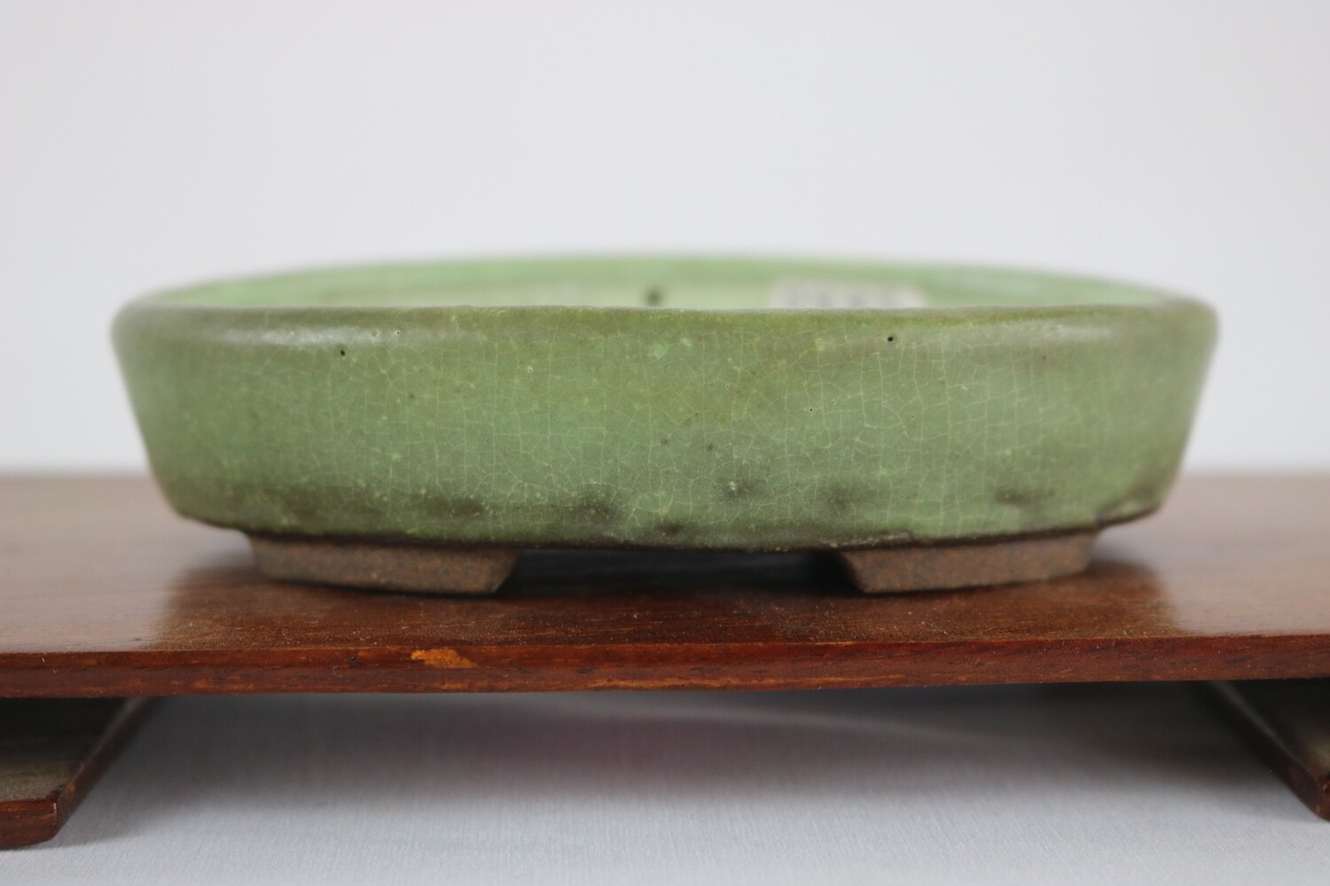 Heian Tofukuji 2nd Generation (東福寺 二代); Japan.  11.3cm; Oval; Glazed; Green Crackle Glaze with Browns; Stamped By Artist;
