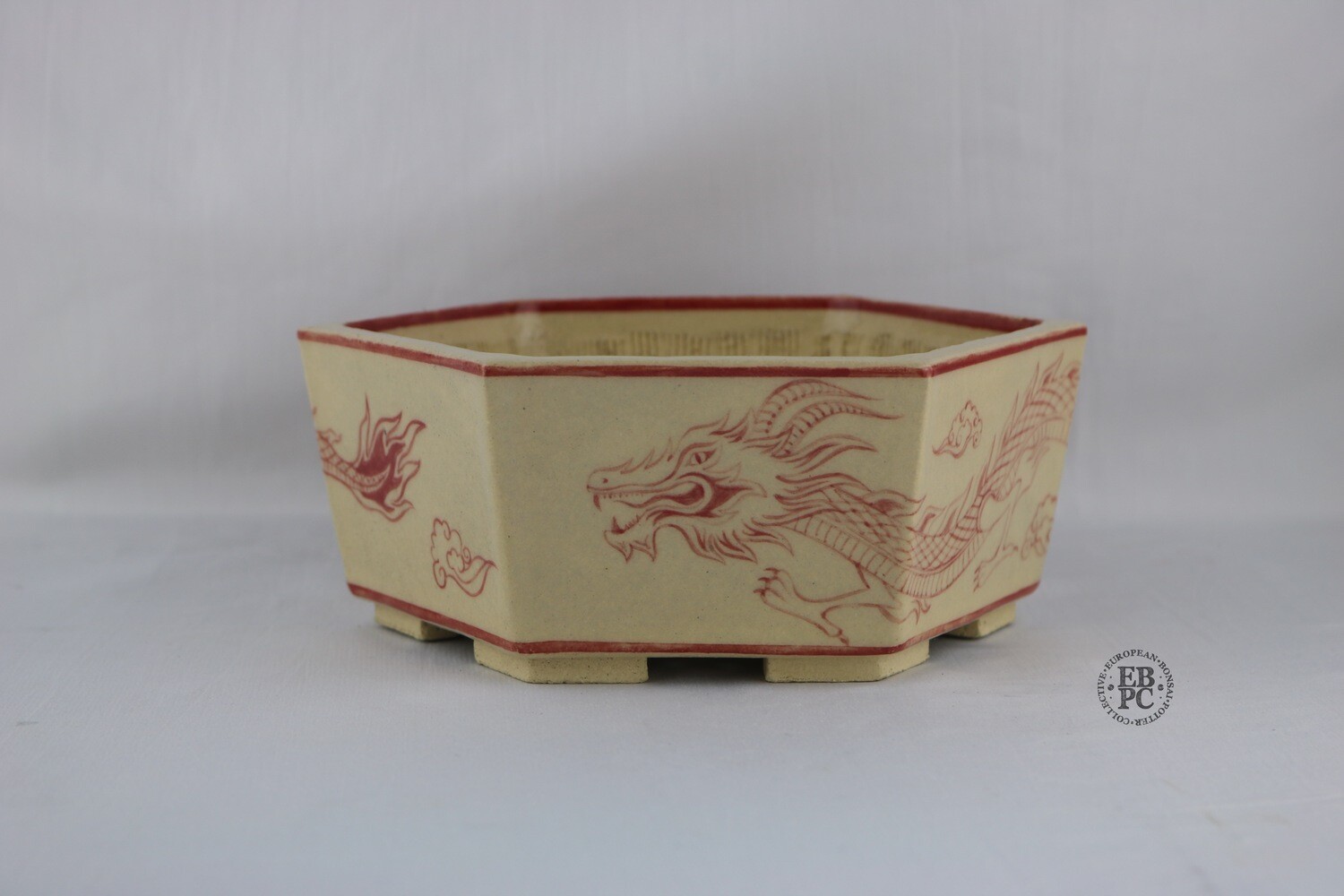 Ilker Durak Bonsai Pots.  18cm; Hexagon; Detailed Dragon; Red Overglaze Painting; Cream / White; Recessed Feet; Handmade in Turkey.