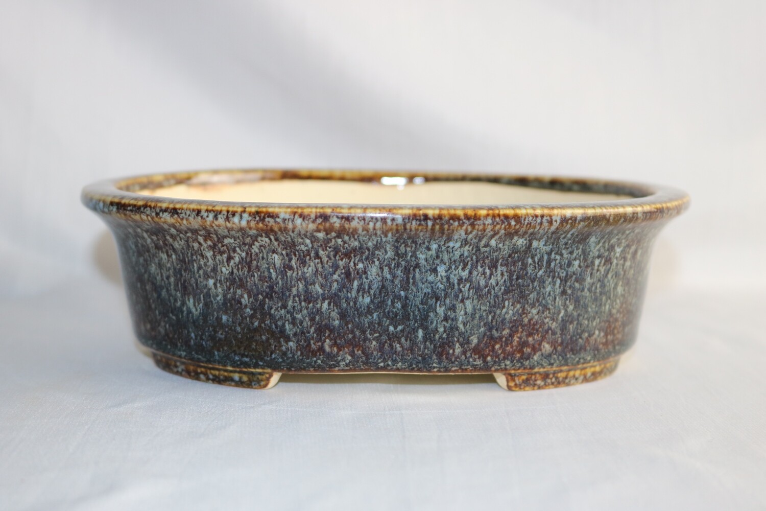 Koyo - 1st Generation. Aiba Kouichirou; Tokoname, Japan. 20.6cm; Oval; Glazed; Namako; Browns; Blue; Whites.
