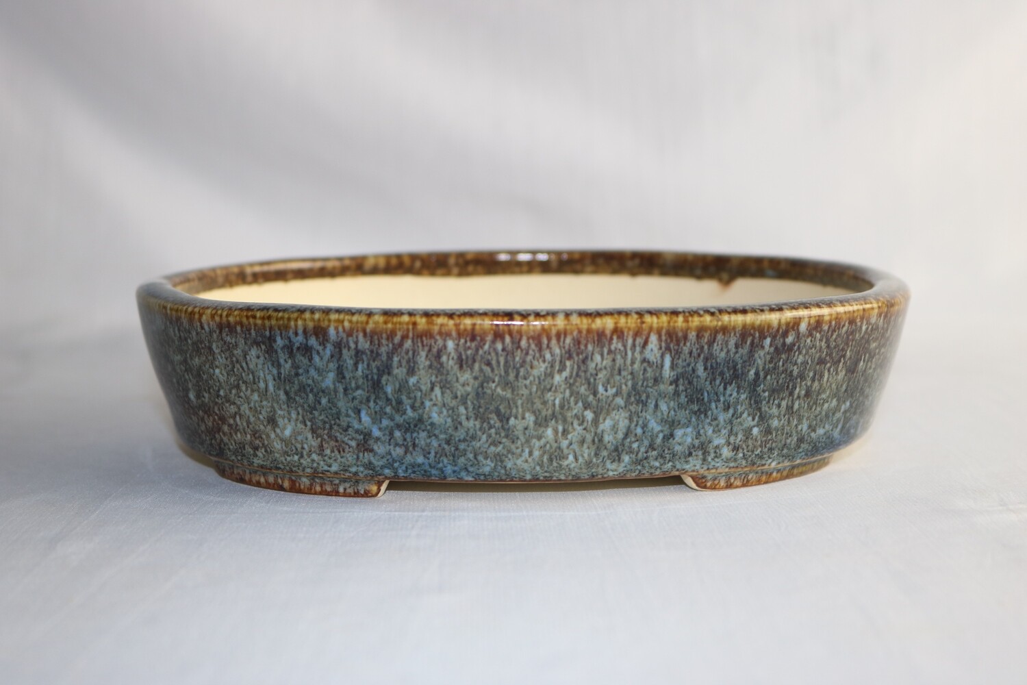 Koyo - 1st Generation. Aiba Kouichirou; Tokoname, Japan. 21.3cm; Oval; Glazed; Namako; Browns; Blue; Whites.
