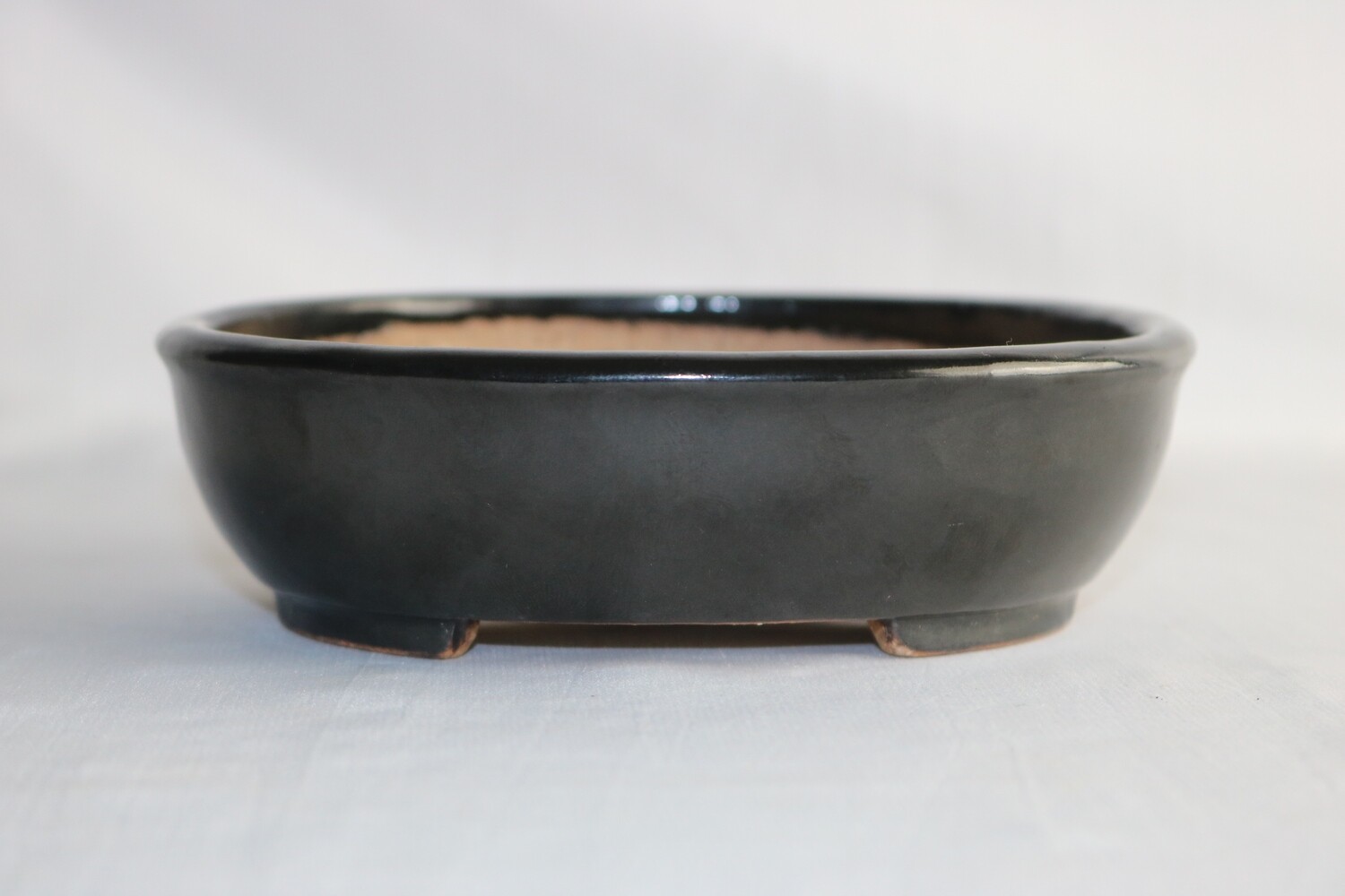 Koyo - 1st Generation. Aiba Kouichirou; Tokoname, Japan. 15.2cm; Deeper Oval; Glazed; Tenmoku; Almost Black.