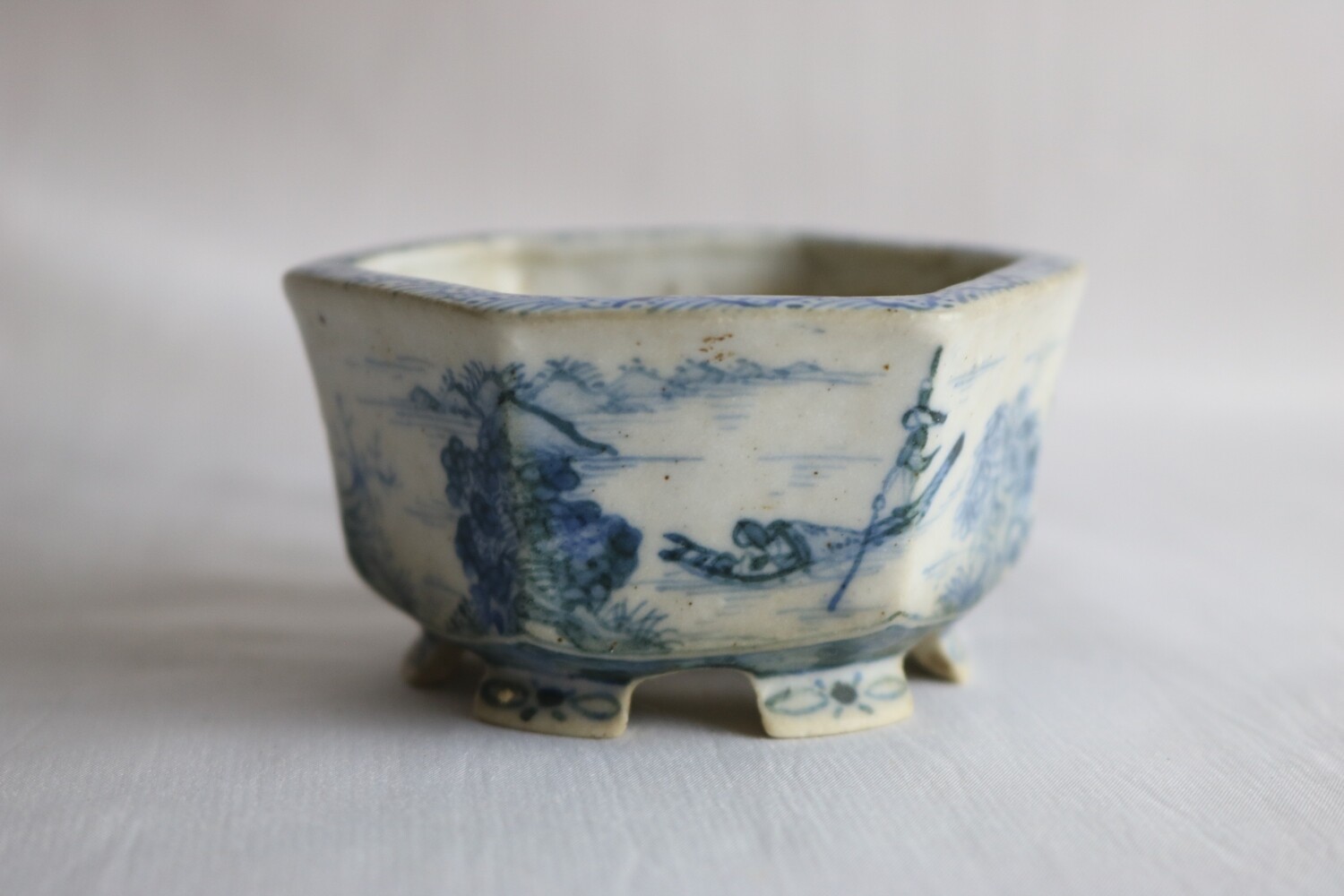 Kutani Nishiki; Japan.   7.7 cm; Porcelain; Hexagonal; Hand-Painted; Sometsuk; Detailed Painted Scenes; Patina Forming