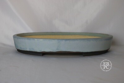Walsall Studio Ceramics - Esther Griffiths.  38.5cm; Oval; Glazed; Lip to Rim; Recessed Feet; Light Blue.