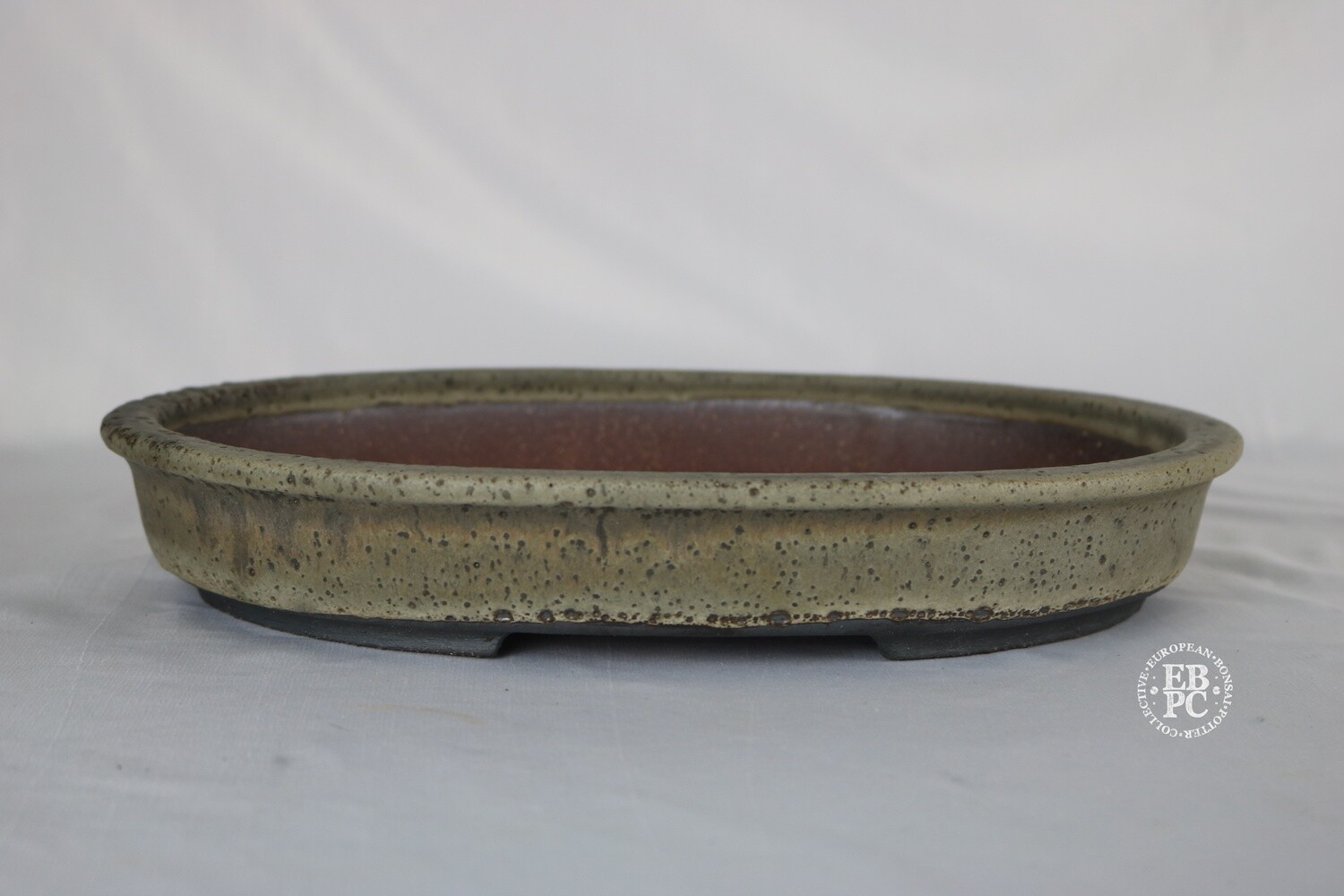 Walsall Studio Ceramics - Esther Griffiths.  30.2cm; Glazed; Oval; Lip to Rim; Recessed Feet; Thick Glaze; Smokey Mottled Grey; Browns.