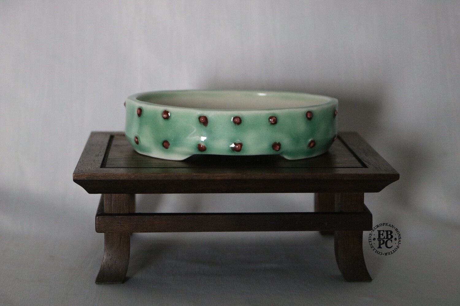 Amdouni Bonsai Pots - 11.9cm; Porcelain; Glazed; Oval; Celadon Green; Red; Rivets; Made by Sami Amdouni.