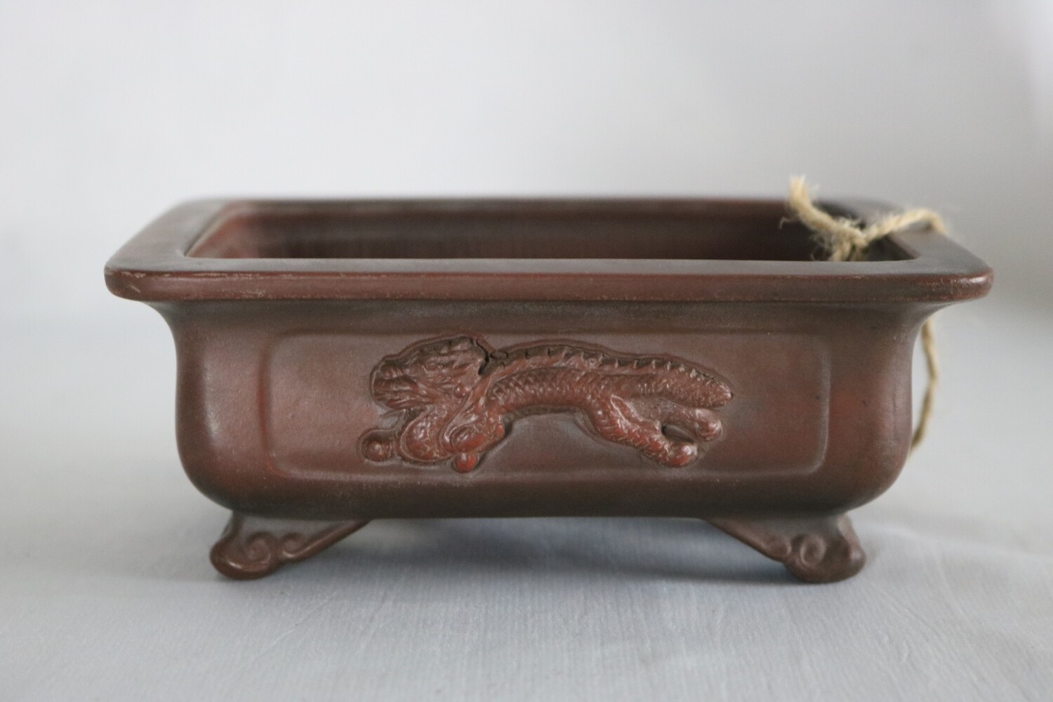 Bigei; Japan. 14.7cm; Rectangle; Unglazed; Recessed Panels; Dragon in Relief; Hand-Signed By Artist;