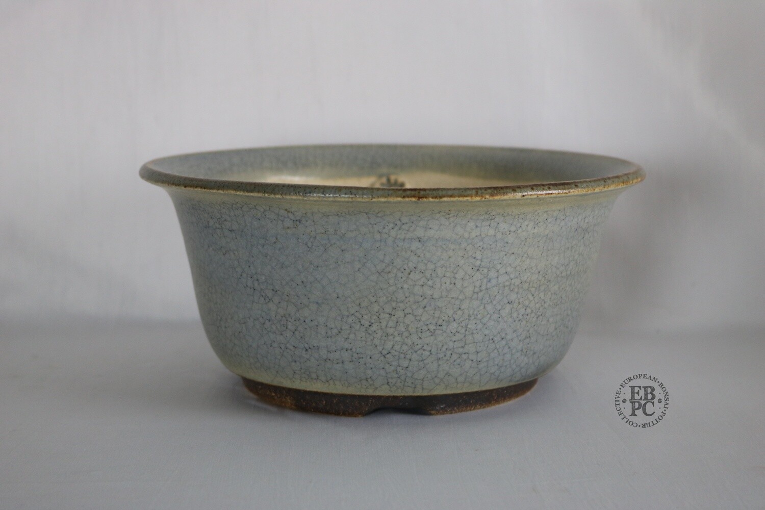 Sabine Besnard - 24.5cm; Round; &#39;Song Glaze&#39;; Light Blue; Browns; Crackle Glaze; EBPC Stamped;