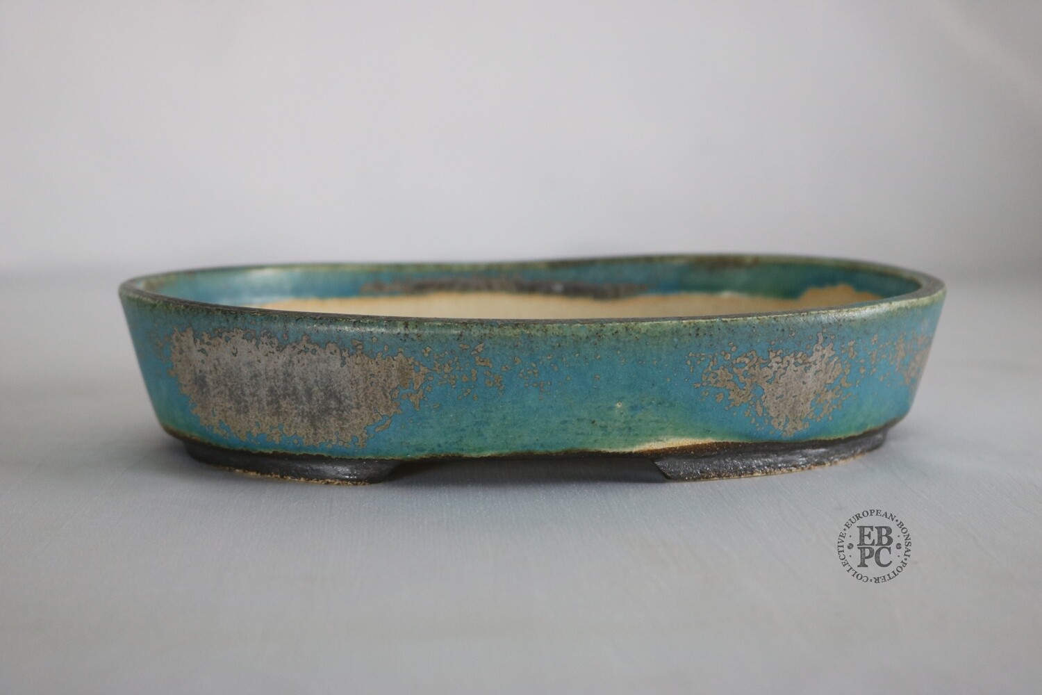 Sabine Besnard - 22cm; Oval; &#39;Okinawa Glaze&#39;; Light Blue; Green; Browns;