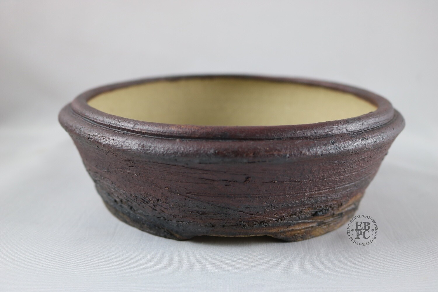 Ian Baillie - 17.3cm; Unglazed; Generous Depth; Light Clay; Browns; Red Tones; Charcoal Grey; Rustic; Aged looking; Hand-signed; EBPC Stamped