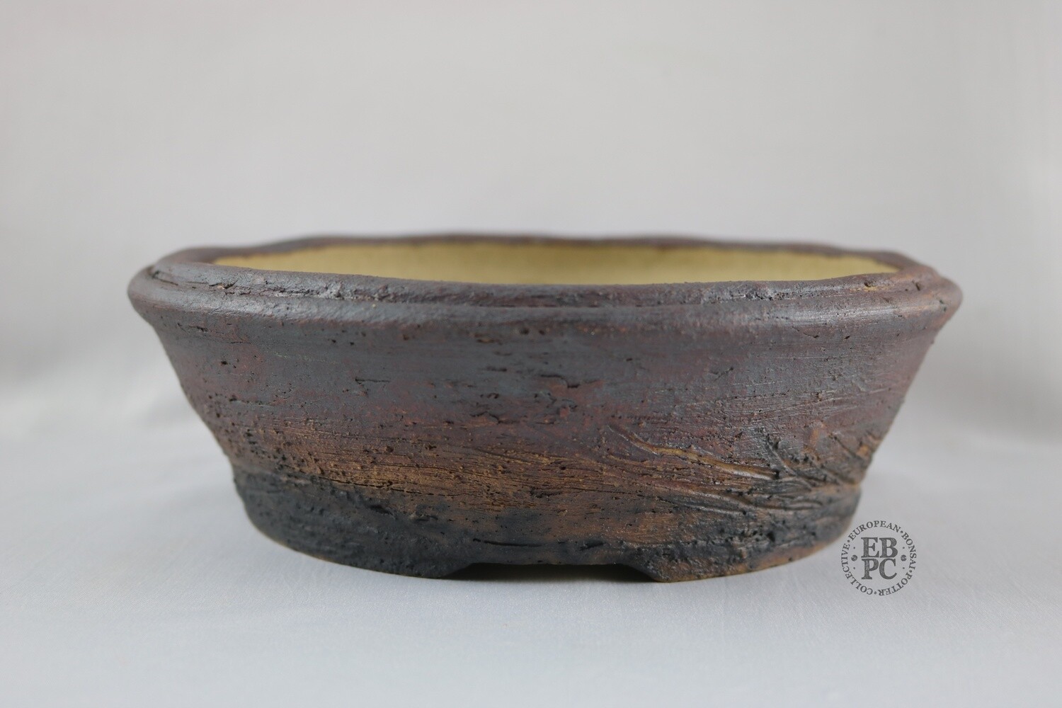 Ian Baillie - 21.8cm; Unglazed; Generous Depth; Light Clay; Browns; Red Tones; Charcoal Grey; Rustic; Aged looking; Hand-signed; EBPC Stamped
