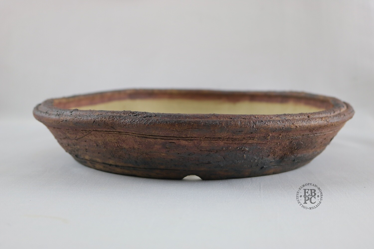 Ian Baillie - 27.2cm; Unglazed; Nanban; Oatmeal Clay; Rustic; Aged looking; Browns; Red Tones; Charcoal Grey; Hand-signed; EBPC Stamped