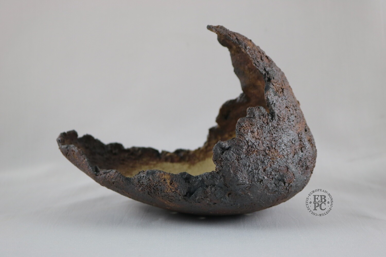 Ian Baillie - 20cm; Cresent Shaped; Brown; Oxide Wash; Textured Finish, EBPC Stamped Hand-signed.