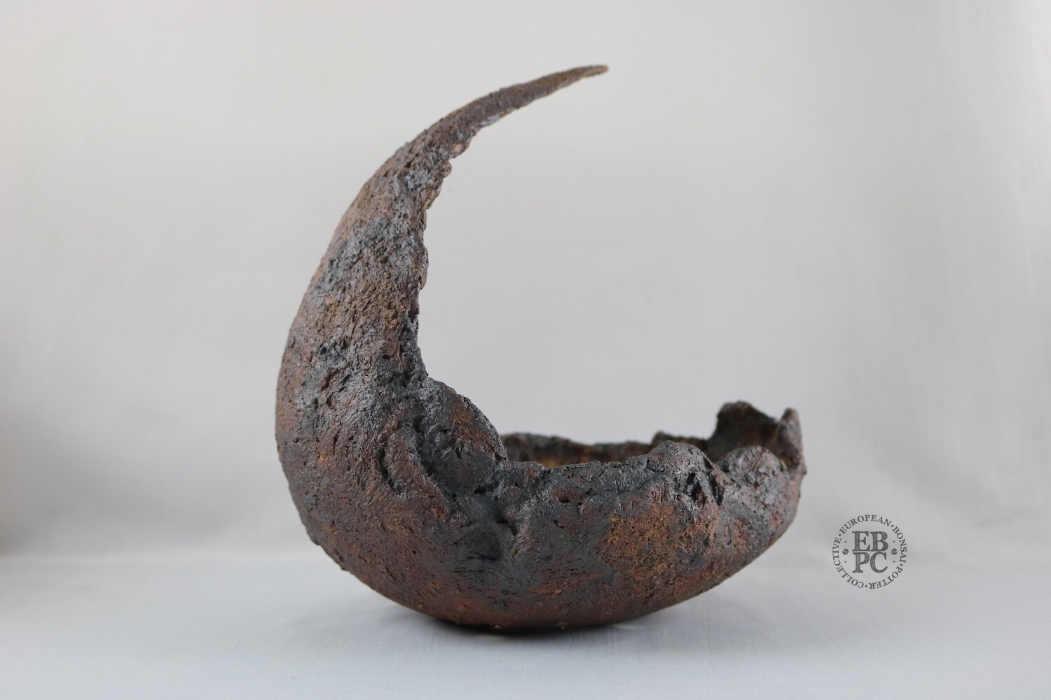 Ian Baillie - 20.1cm; Cresent Shaped; Sculptural; Textured Finish, Brown; Oxide Wash;  EBPC Stamped Hand-signed.