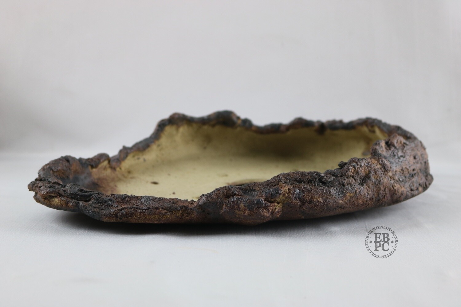 Ian Baillie - 37cm; Freeform Slab; Rustic; Oxide Wash; Browns; Greys; Red tones; Hand-signed; EBPC Stamped.