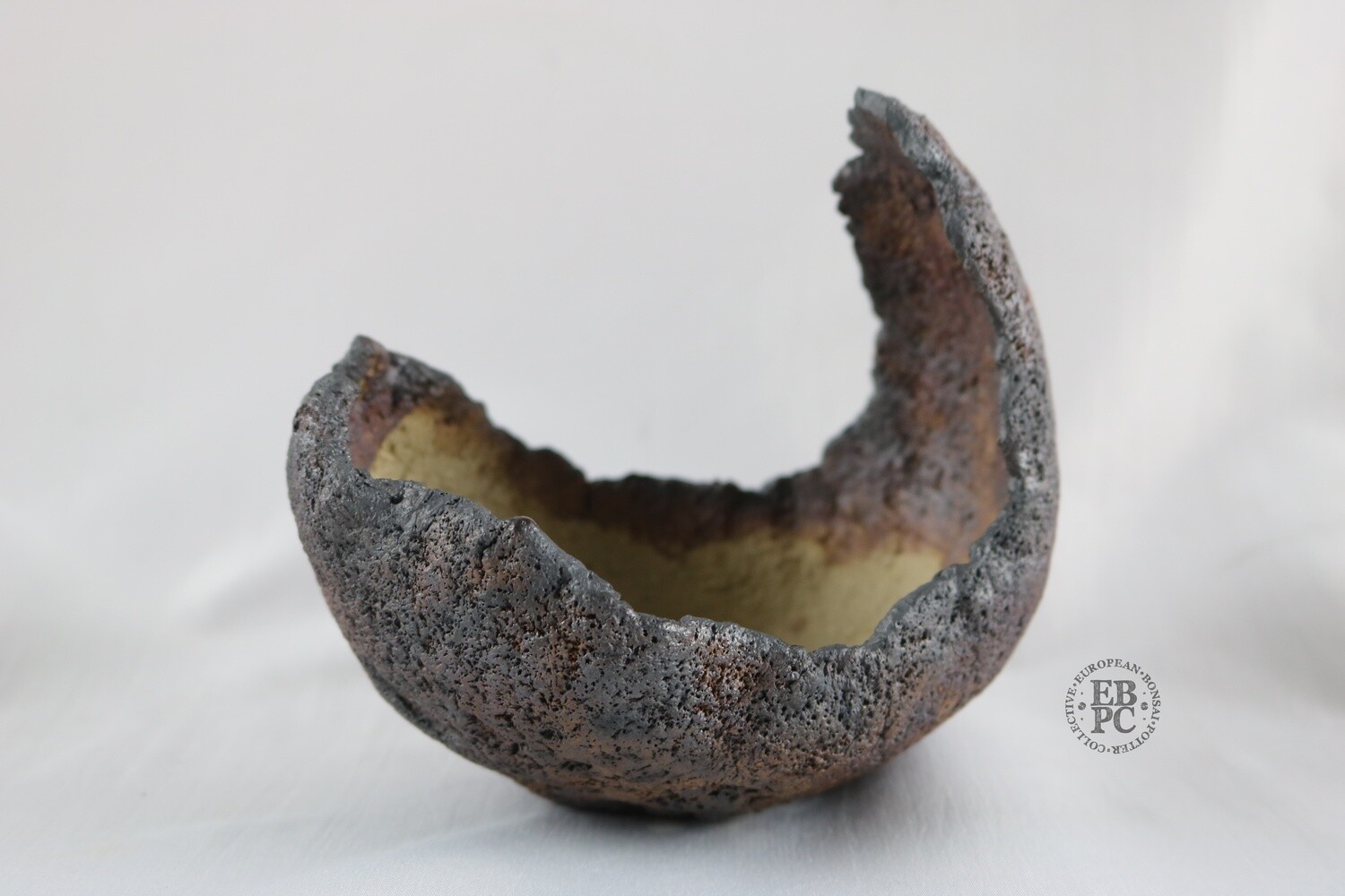 Ian Baillie - 12.1cm; Cresent Shaped; Brown; Oxide Wash; Textured Finish, Hand-signed.