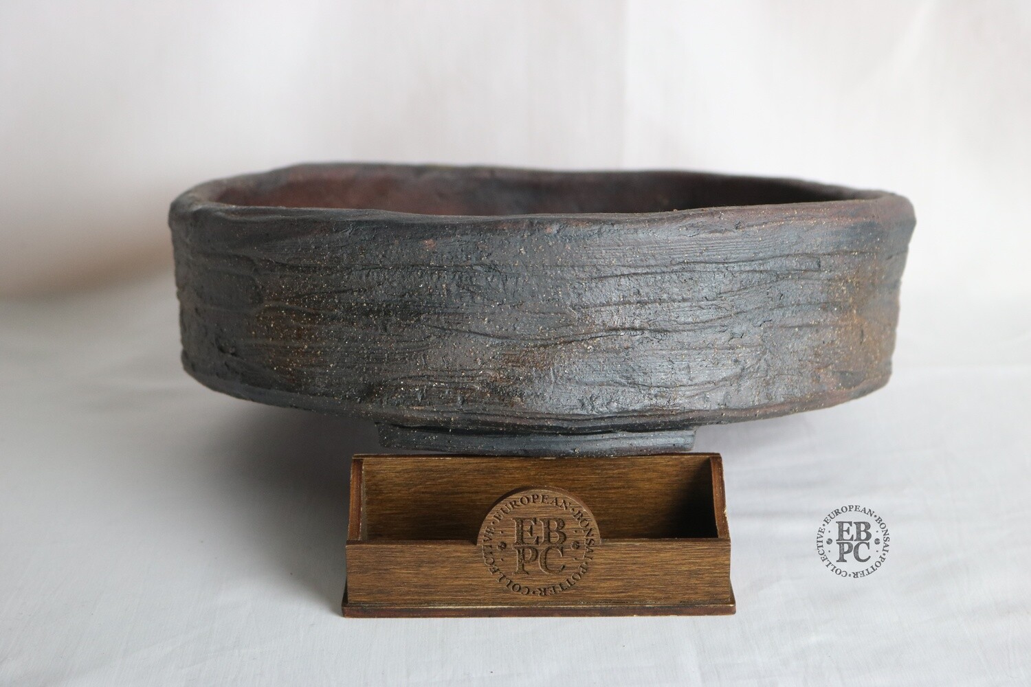 Walsall Studio Ceramics - Esther Griffiths.  27.6cm; Unglazed; Round; Deep Nanban Style; Recessed Feet;  Gunmetal Grey; Browns.