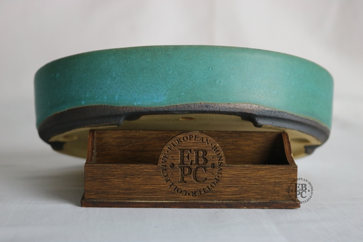 Walsall Studio Ceramics - Esther Griffiths; 20.1cm; Oval; Glazed; Vibrant Aquamarine Matt; Browns; Green; Blue; EBPC Stamped.