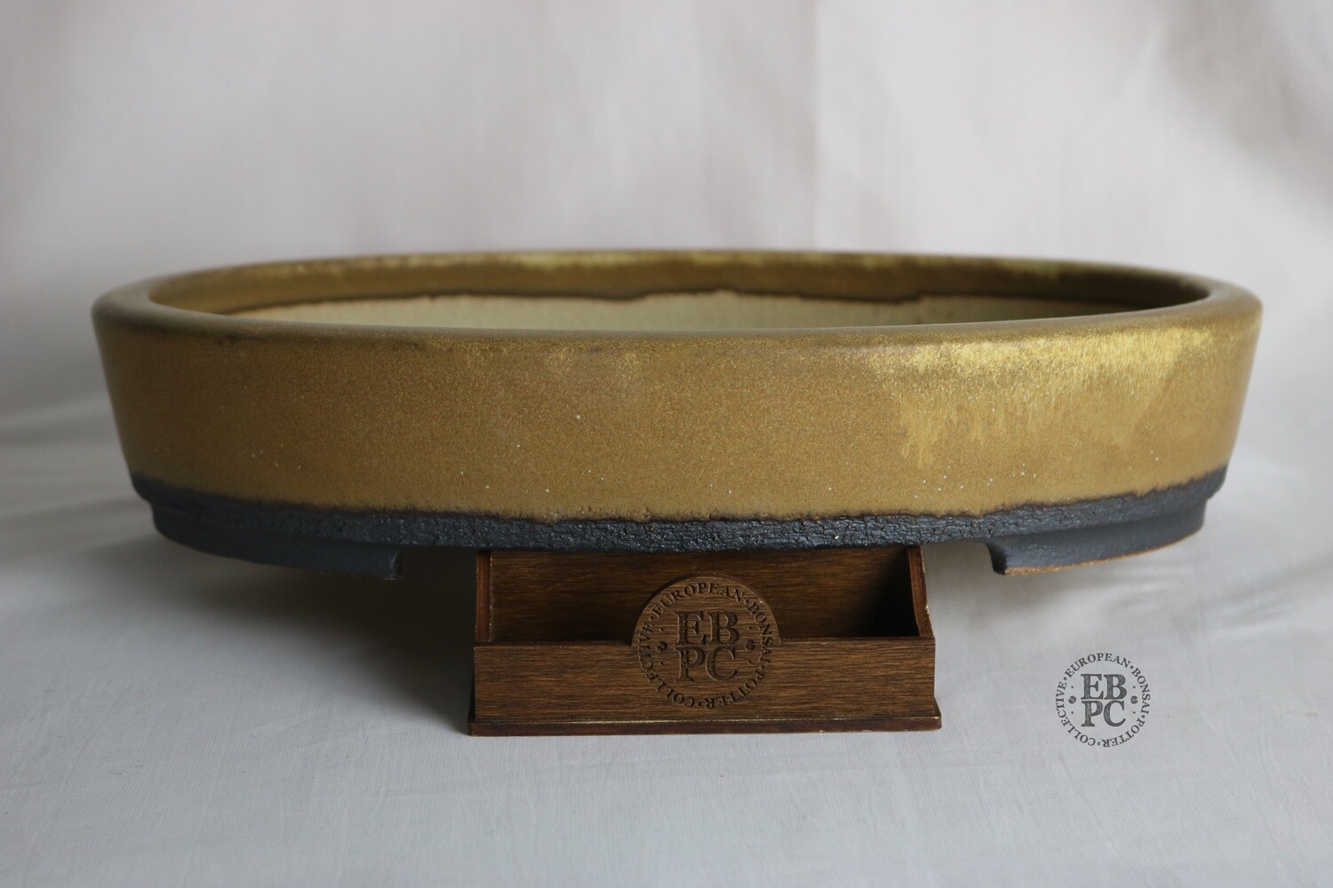 Walsall Studio Ceramics - Esther Griffiths; 35.7cm; Oval; Dappled Glaze; Olive Green/Brown Over Cream; EBPC Stamped.