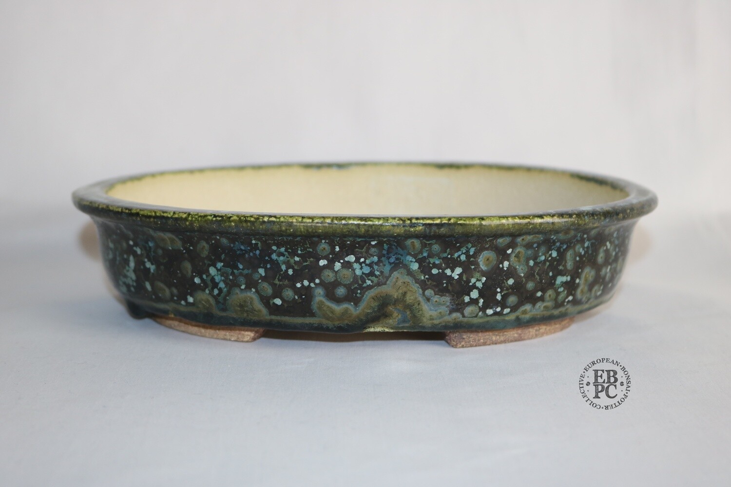 Bruno Auvinet - 23cm, Glazed; Oval; Crystalline Glaze; Dark Olive Green; Brown; Light Blue, White; Yellow; EBPC Stamped; Bruno Auvinet