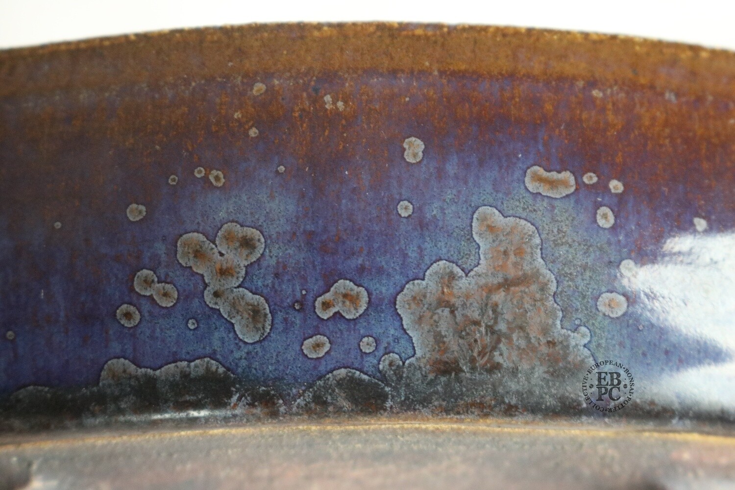 Bruno Auvinet - 25cm, Glazed; Oval; Crystalline Glaze; Dark Toffee Brown; Purple, Yellow; EBPC Stamped.