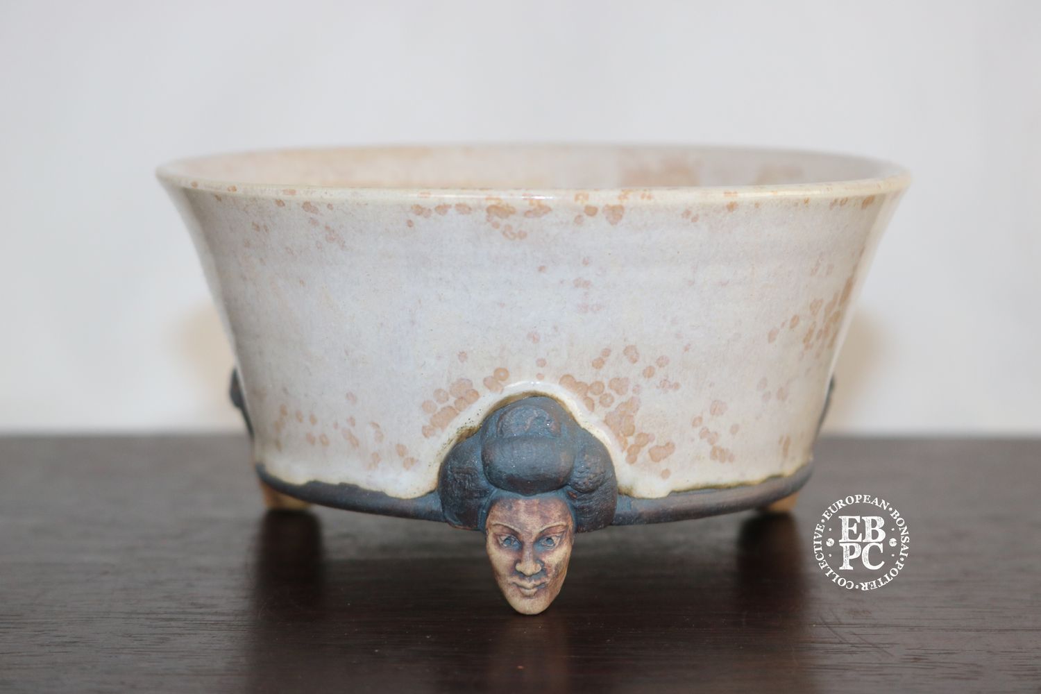 Greg Ceramics - 13.7cm; Round; Glazed; Sculpted Feet; Samurai Heads: Crystalline Glaze. EBPC Stamped.