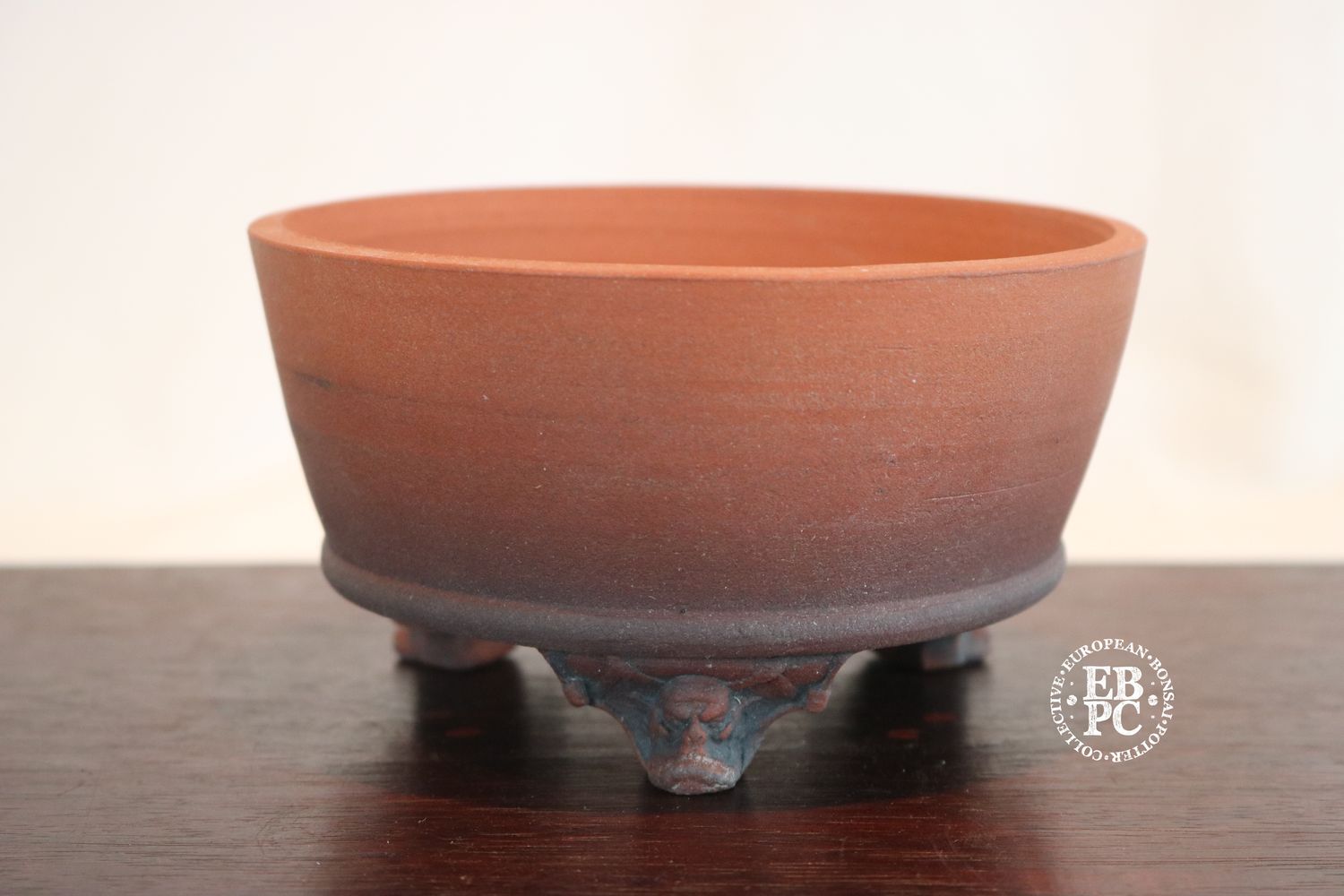 Greg Ceramics - 14.2cm; Round; Unglazed; Sculpted Feet; Ogre Heads: Refined Finish. EBPC Stamped.