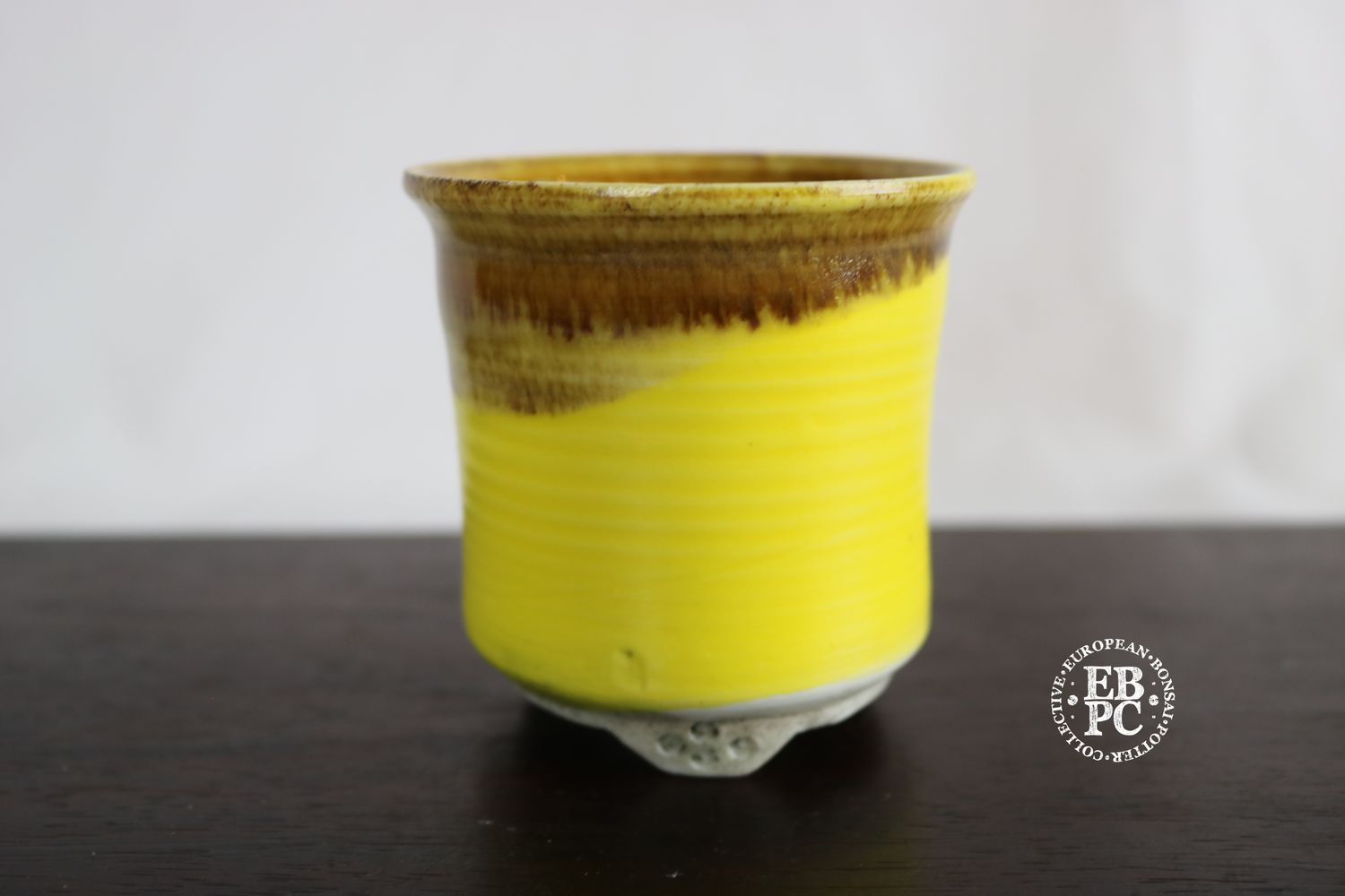 EBL Pots - 7.8cm; Porcelain; Handmade; Shohin / Accent Pot; Round; Vibrant Yellow Glaze; Volcanic Sand Brown; Detailed Feet; Elsebeth Ludwigsen