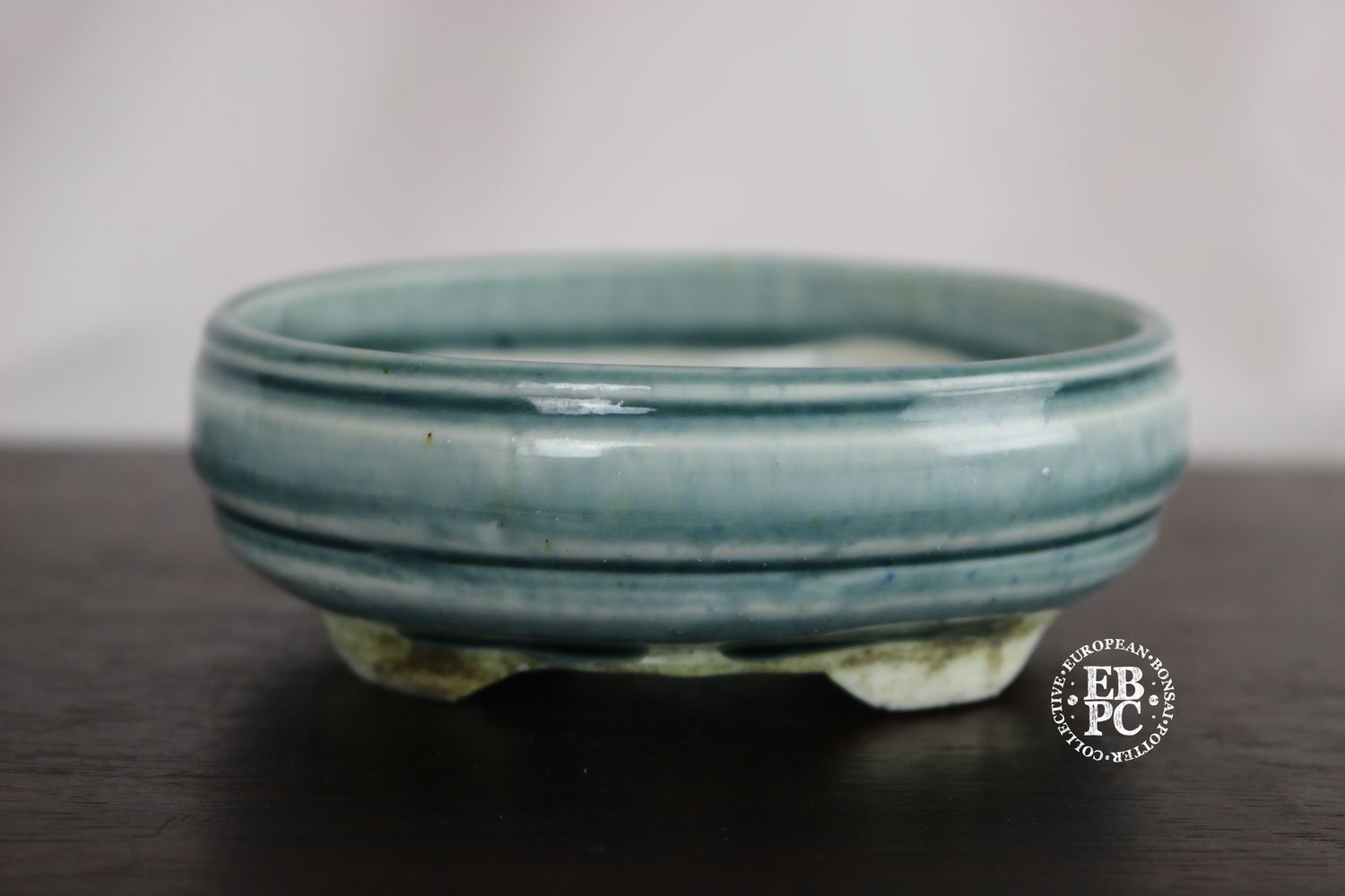 EBL Pots - 11cm; Porcelain; Handmade; Shohin Pot; Oval; Semi Translucent Blue/ Green Glaze; Detailed Feet; Elsebeth Ludwigsen