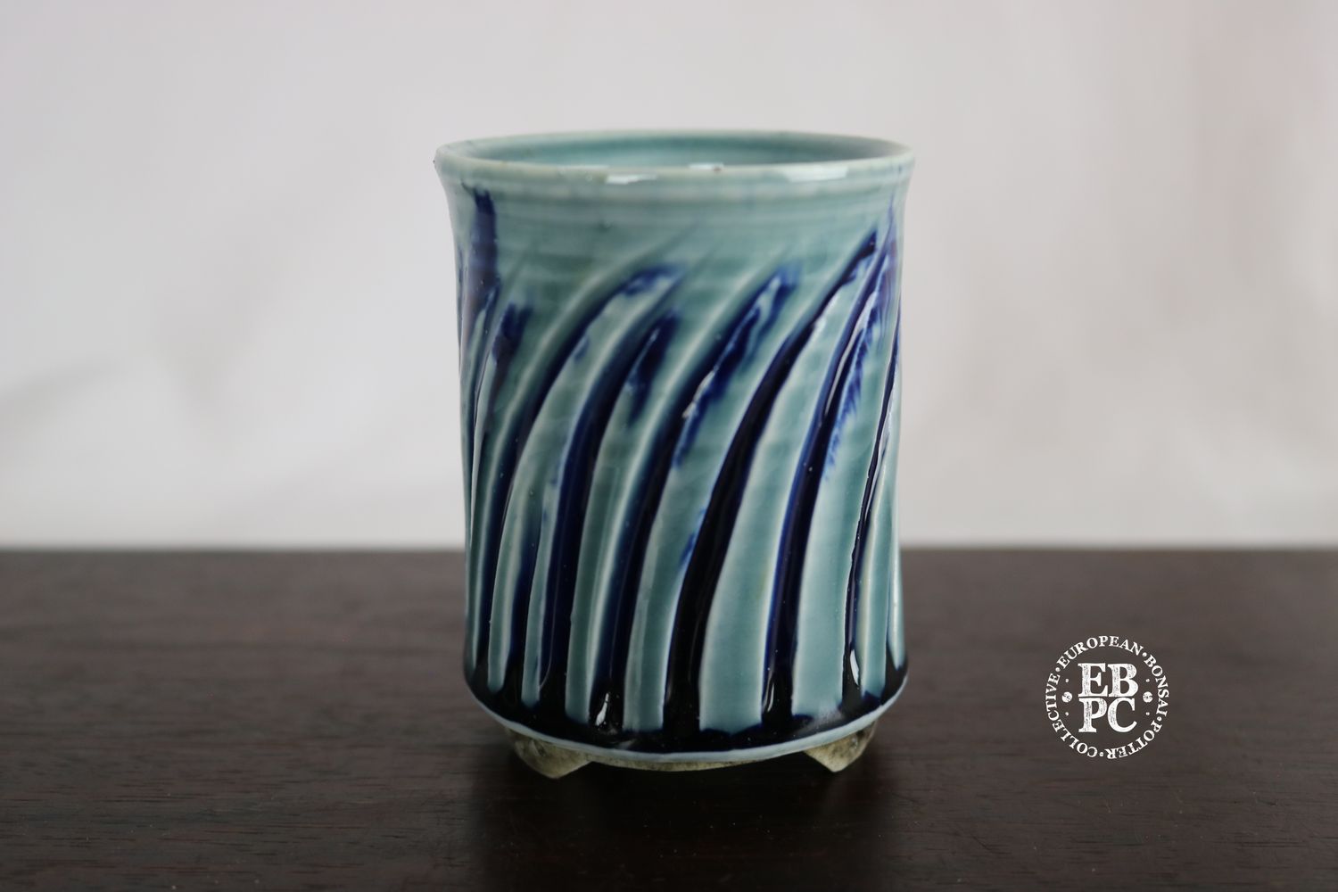 EBL Pots - 8.2cm; Porcelain; Handmade; Mame/Shohin/Accent Pot; Round; Carved Stripes Design; Light Green &amp; Dark Blue Glaze; Detailed Feet; Elsebeth Ludwigsen