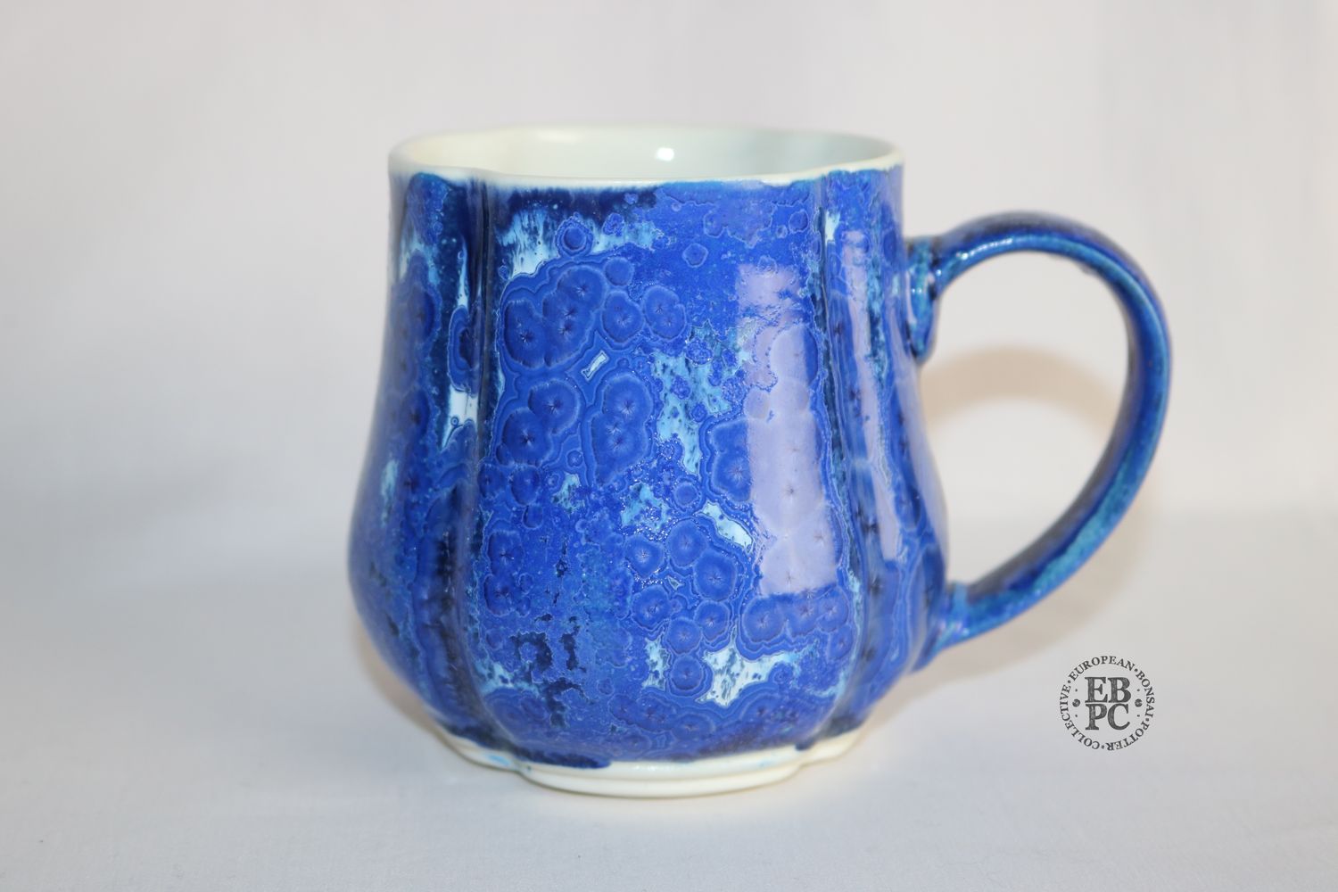 O Yaku - Crystalline Glazed Mug; Porcelain; Mokko Design; Crystalline Glaze; Blues; EBPC Dual-stamped; Shay Cohen, Israel.