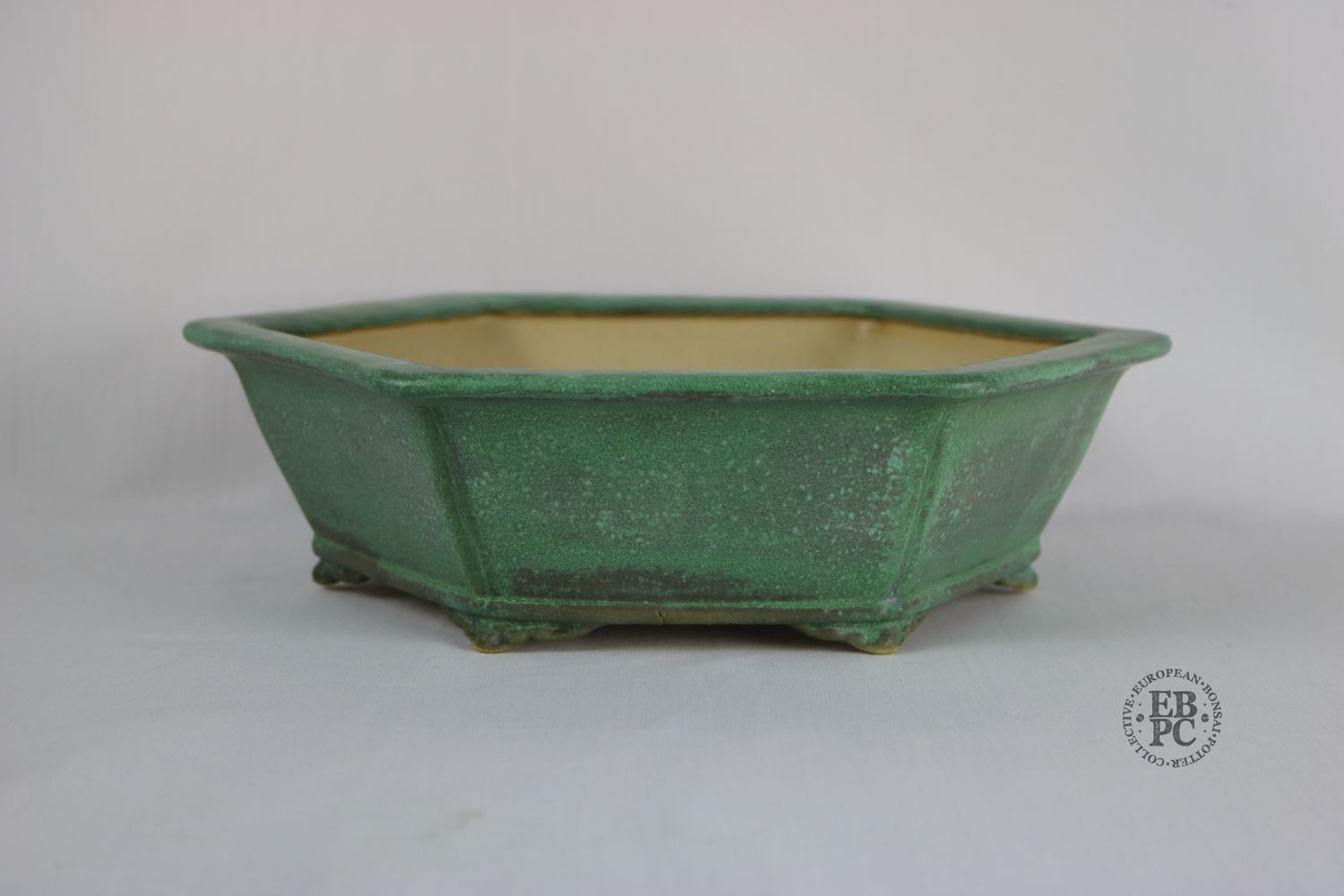 Fukurou Ceramics - Switzerland.   Hand-made; 26cm; Hexagon; Incised &#39;Corners&#39;; Lip to Rim; Basal Band in Relief; Cloud Feet; Glazed; Rusted Copper Greens; Stone Grey; Patrik Lüthi