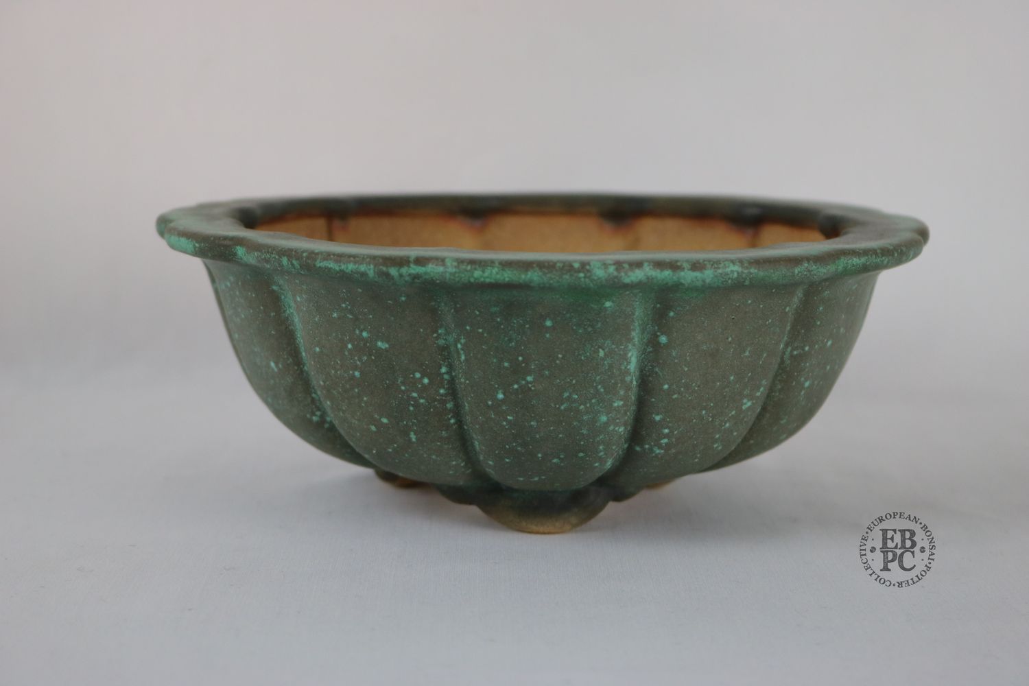 Fukurou Ceramics - Switzerland.  19.3cm; Hand-made; Rinka Design; (Flower shape); Intricate Design; Sculpted Feet; Aged-looking Glaze; Copper Green ; Brown/Grey; Patrik Lüthi: EBPC Stamped.