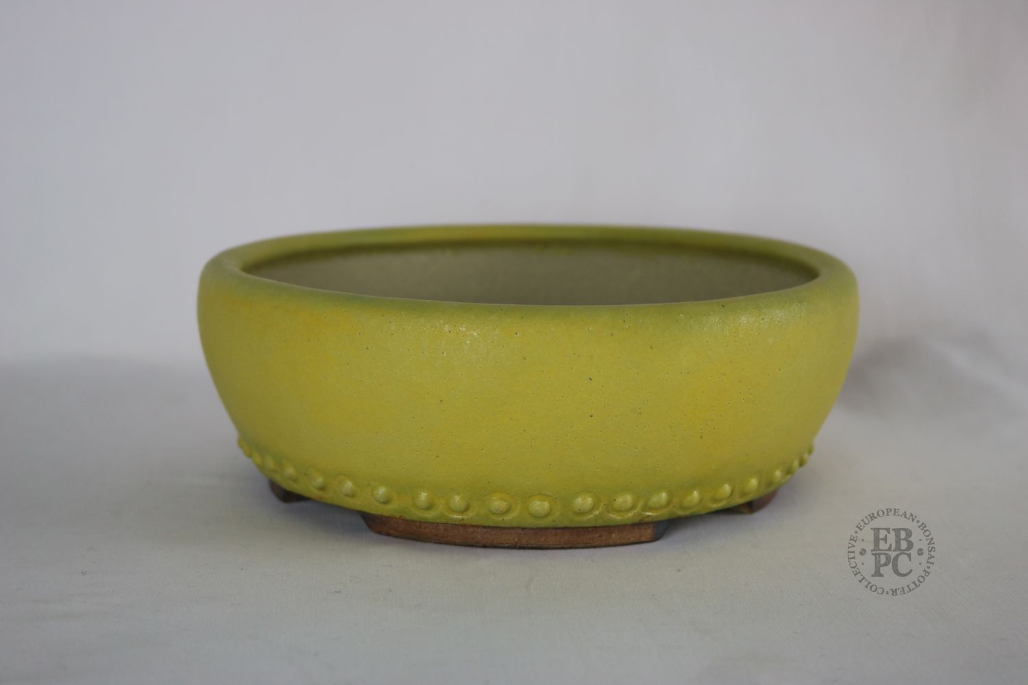Ian Baillie - 20.4cm; Elegant Form; Round; Rivets; Vibrant Yellow; Subtle Green Hints; Hand-signed; Stamped - EBPC IB, &amp; Scotland.
