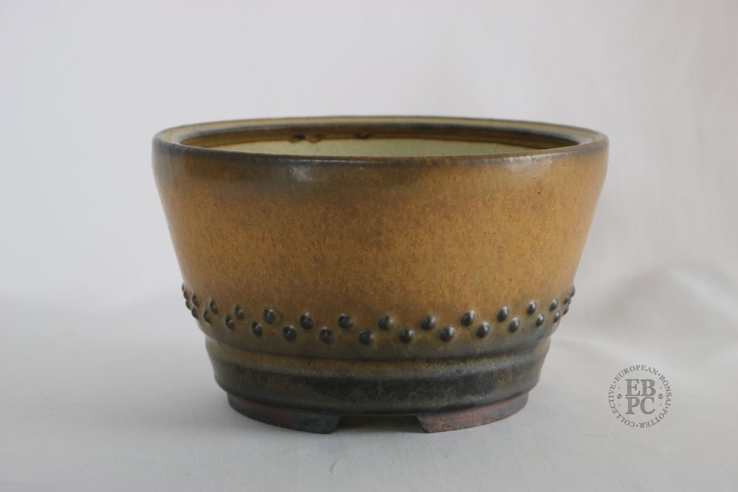 Ian Baillie, Scotland.   - 17.5cm; Unique Detailed Design; Glazed; Cascade / Drum Fusion Design; Rivets/Studs; Stunning Glaze; Browns; Hand-signed; EBPC Stamped.
