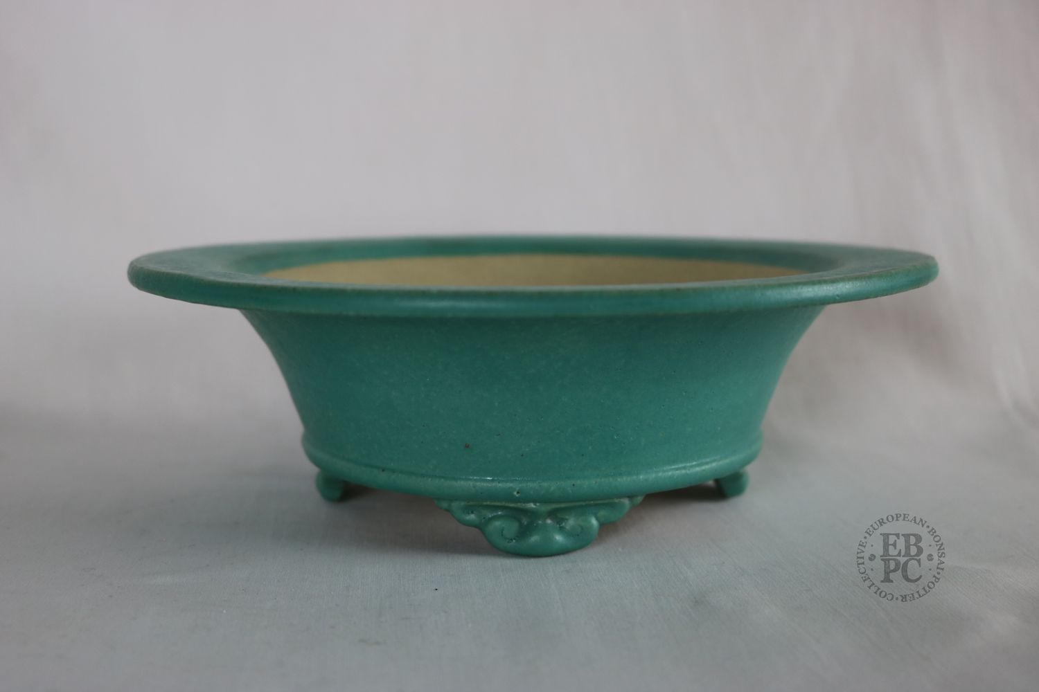 Ian Baillie -  22.5cm; Glazed; Round; Vibrant Turquoise Blue; Brown Hints; Aged Looking Glaze; Hand-signed; EBPC Stamped
