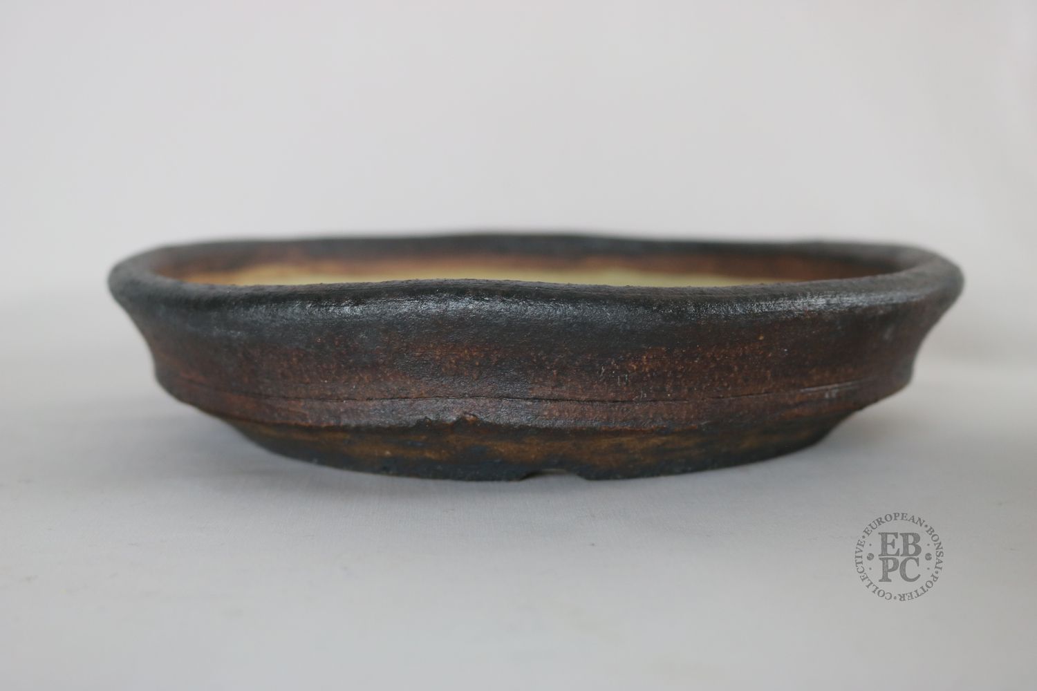 Ian Baillie - 20.5cm; Unglazed; Nanban; Oatmeal Clay; Rustic; Aged looking; Browns; Red Tones; Charcoal Grey; Hand-signed; EBPC Stamped