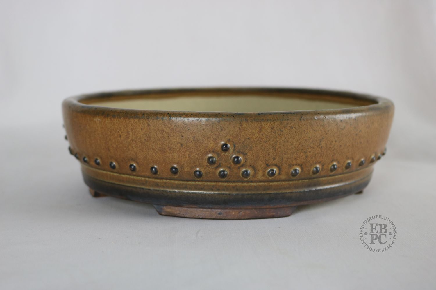 Ian Baillie - 22cm; Round; Drum Style; Superb Glaze; Browns; Smokey Amber; Brown; Basal Band; Rivets/Studs; Excellent Piece!