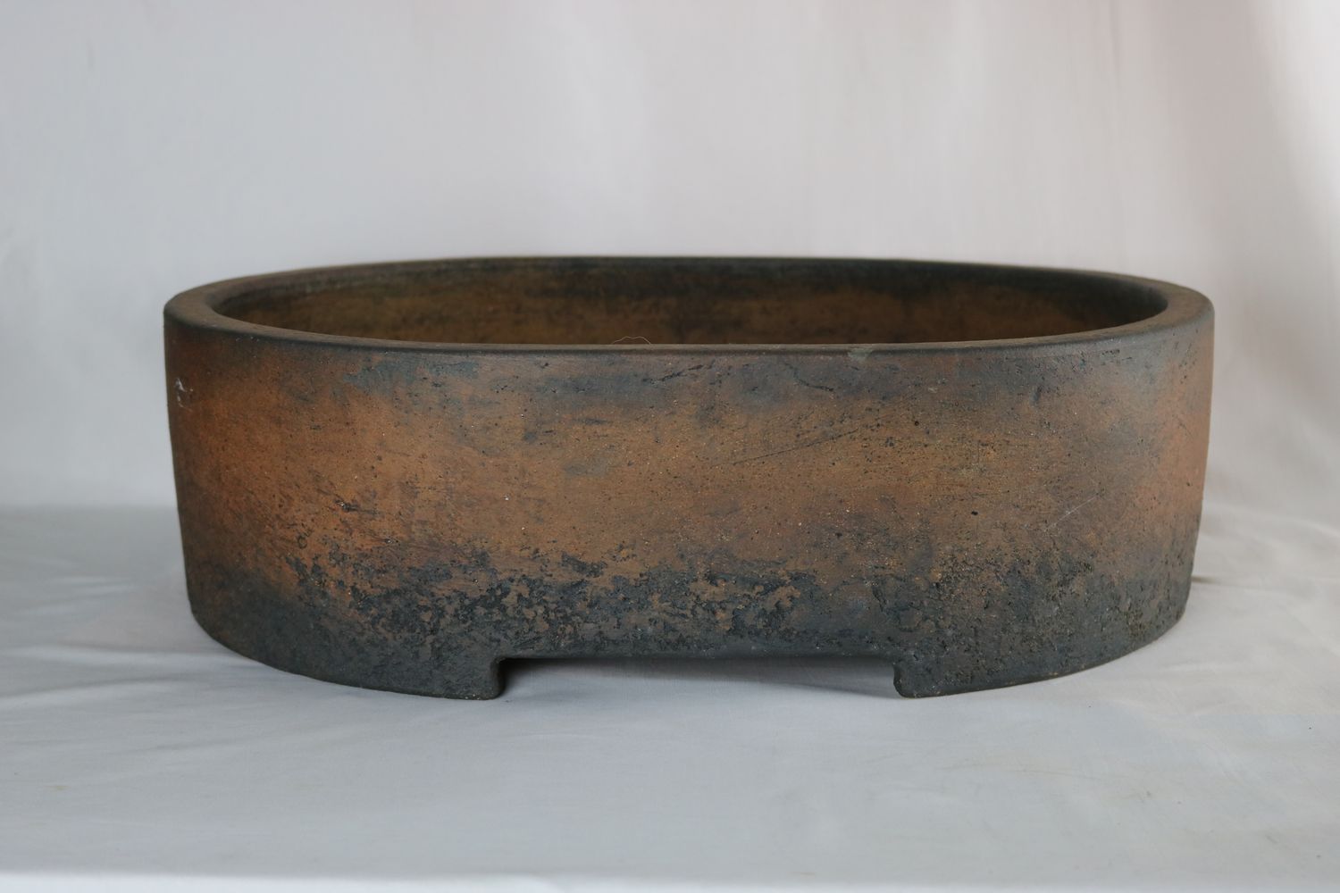 Gordon Duffett - England.  50cm; 1992 Made; Deep Oval; Glazed; Older Pre-Loved Pot; Reddish-Brown; Aged Textured Finished.