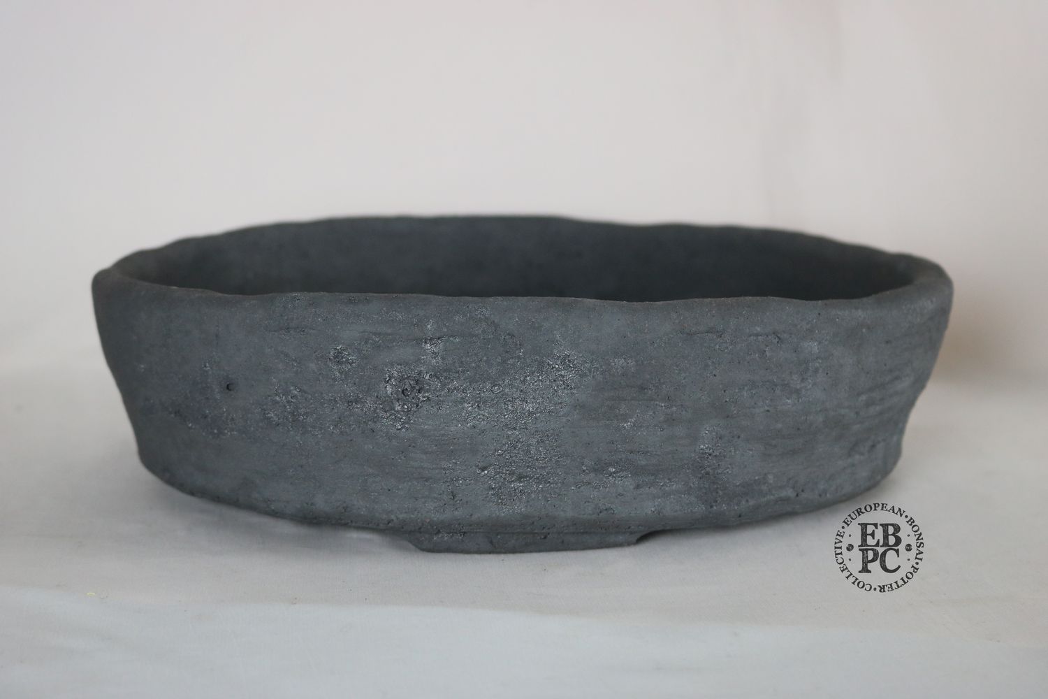 Bryan Albright - 32cm; Round; Deep Nanban Style; Unglazed; Grey Clay; Deep Profile; Subtle Texture.