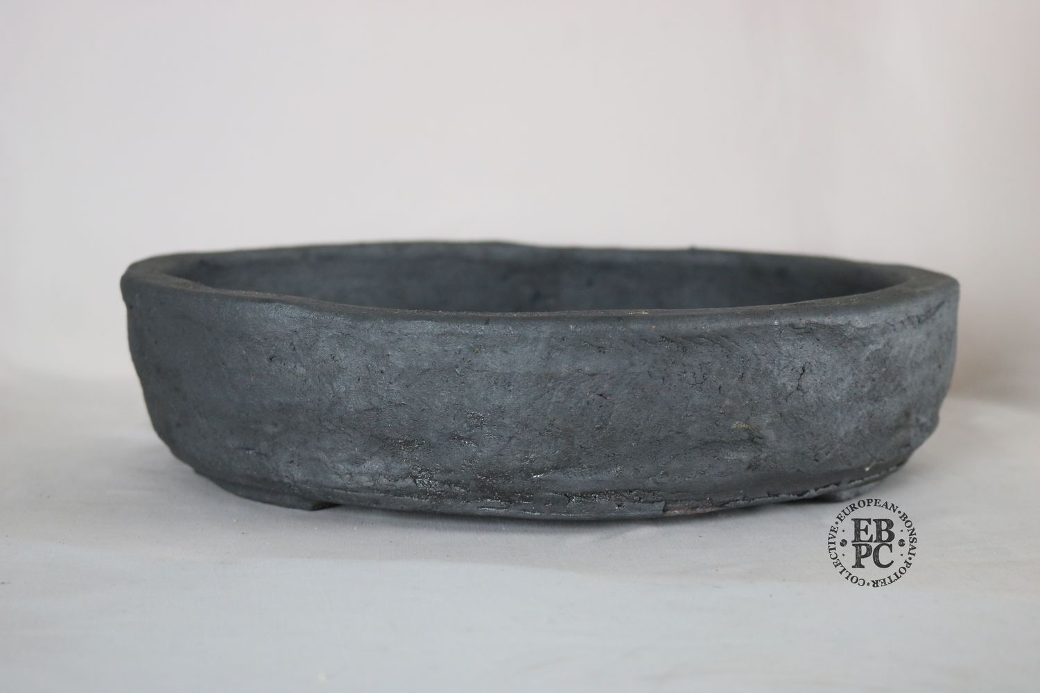 Bryan Albright - 33cm; Round; Deep Nanban Style; Unglazed; Grey Clay; Deep Profile; Subtle Texture.