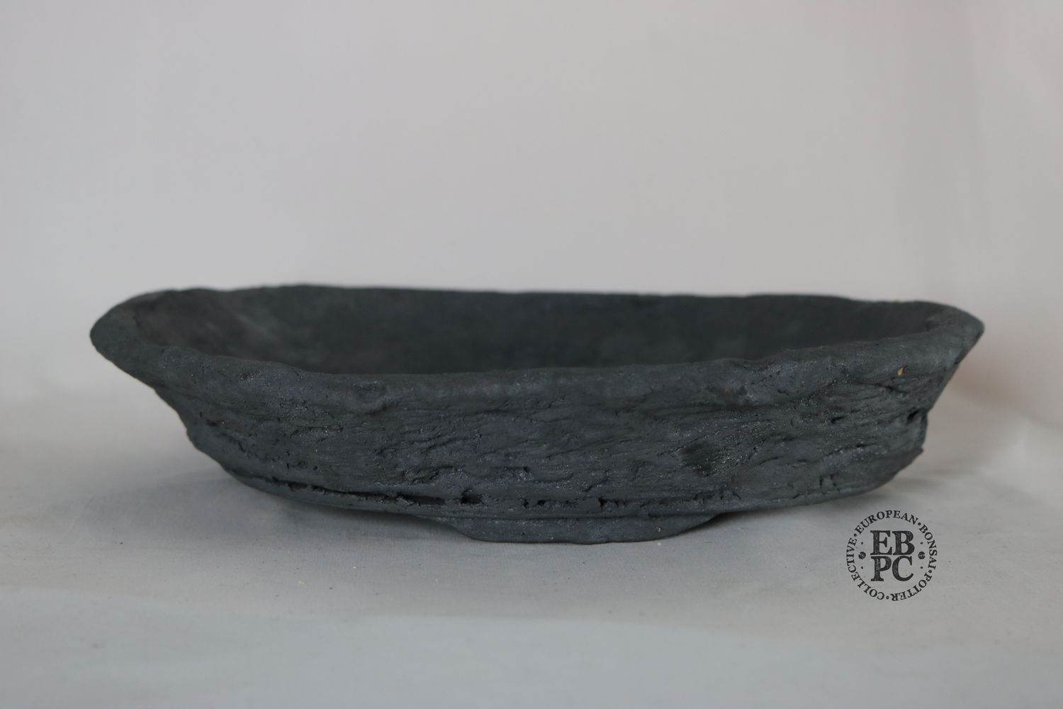 Bryan Albright - 33.5cm; Round; Nanban Style; Unglazed; Grey Clay; Subtle Texture.
