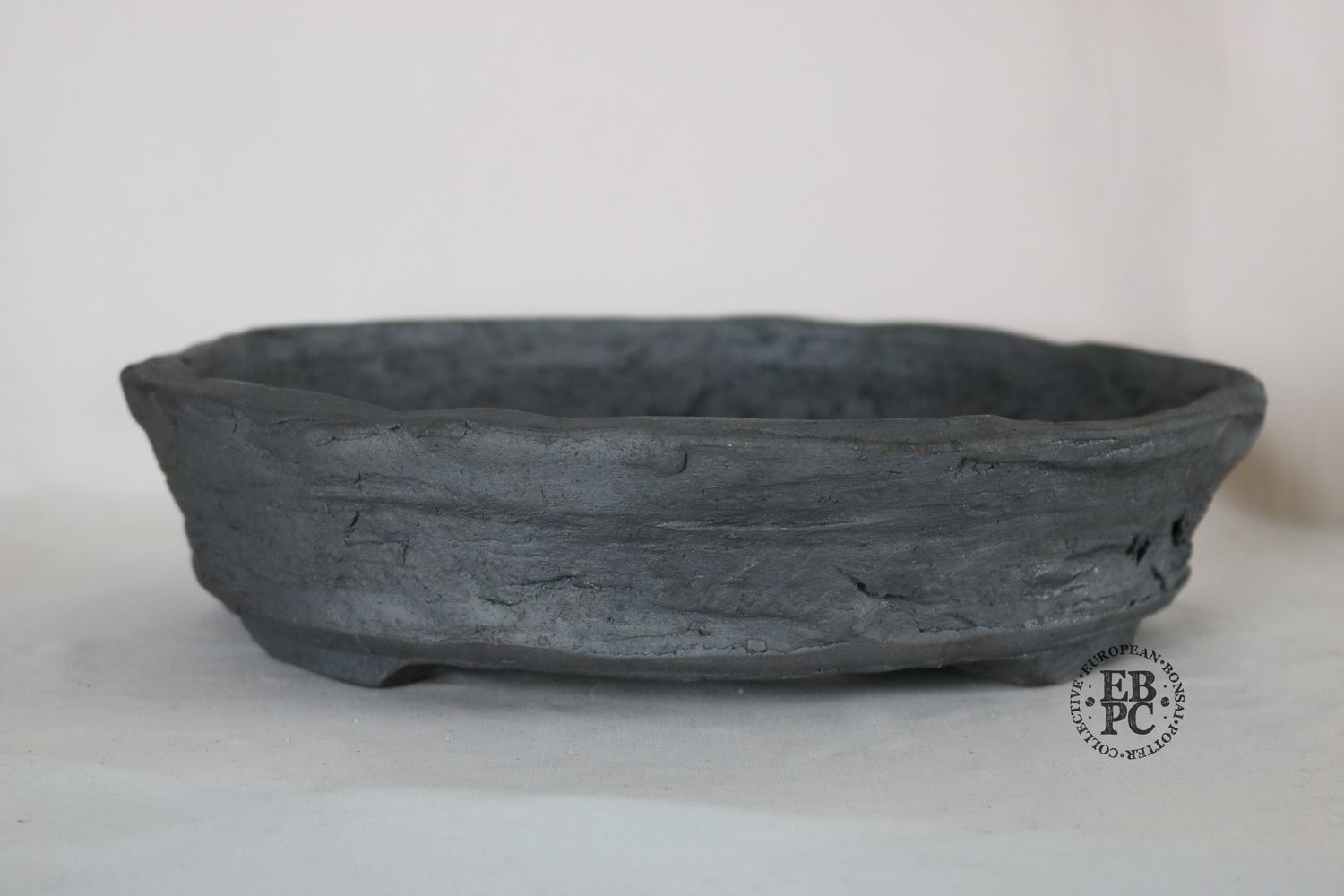 Bryan Albright - 33cm; Round; Deep Nanban Style; Unglazed; Grey Clay; Deep Profile; Subtle Texture.