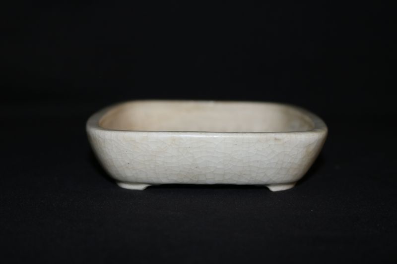 Haruyoshi - Yoshiaki Azeyanagi, Japan. 15.4cm; Rectangle; Glazed; Cream; Crackle Glaze.   *A very well regarded Japanese potter.