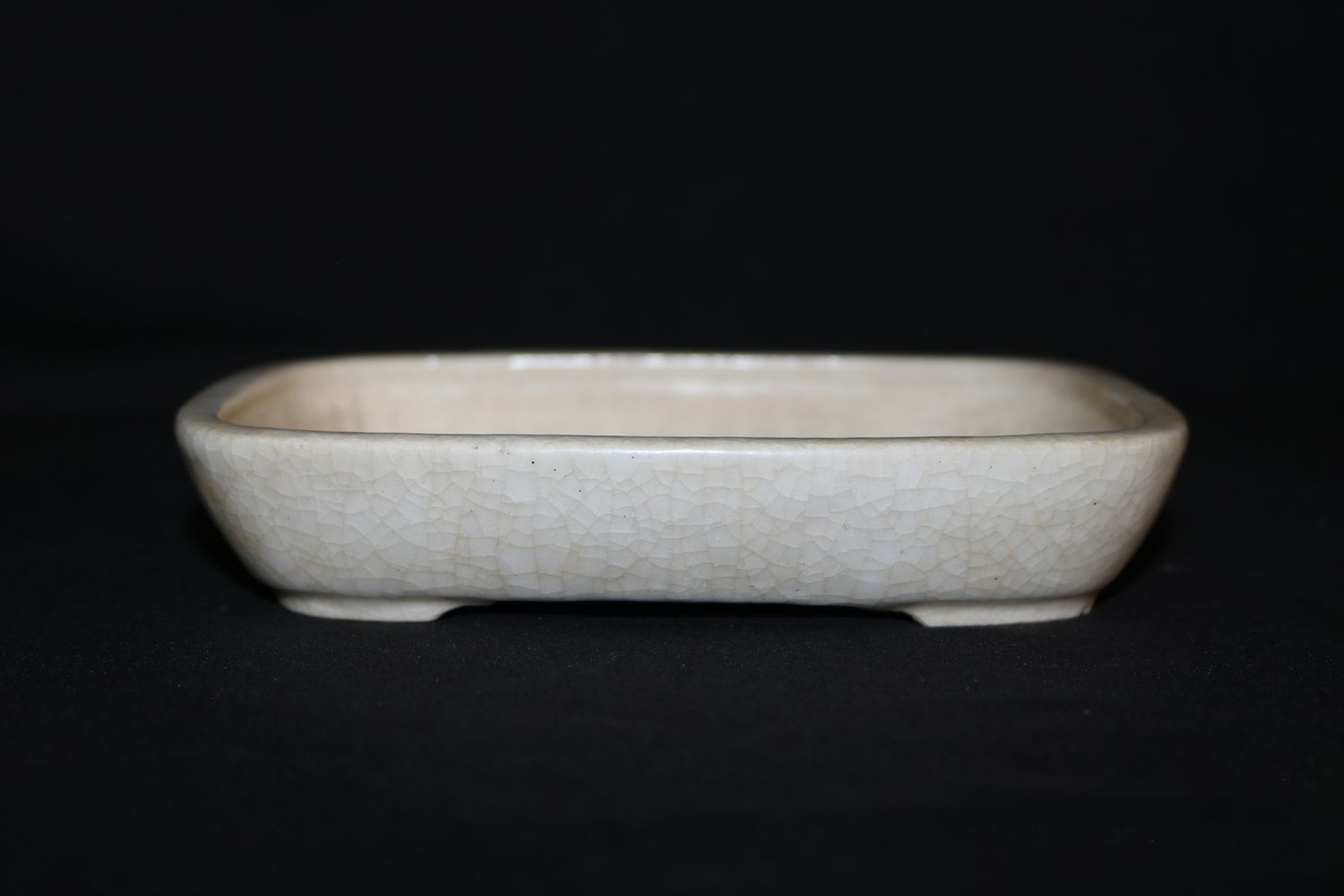 Haruyoshi - Yoshiaki Azeyanagi, Japan. 15.4cm; Rectangle; Glazed; Cream; Crackle Glaze.   *A very well regarded Japanese potter.