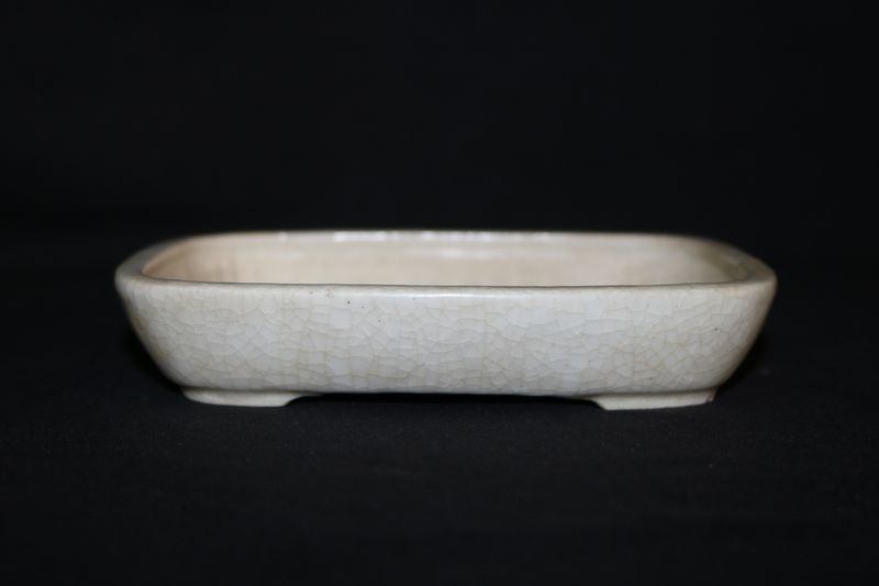 Haruyoshi - Yoshiaki Azeyanagi, Japan. 15.4cm; Rectangle; Glazed; Cream; Crackle Glaze.   *A very well regarded Japanese potter.