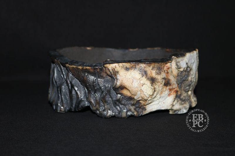 Eddie Curtis, England.   - 18cm; Unique Design Oval; Rock Effect; Shino Glaze; Multiple Glaze Techniques; Various Distinct Textures; Artist Stamped;