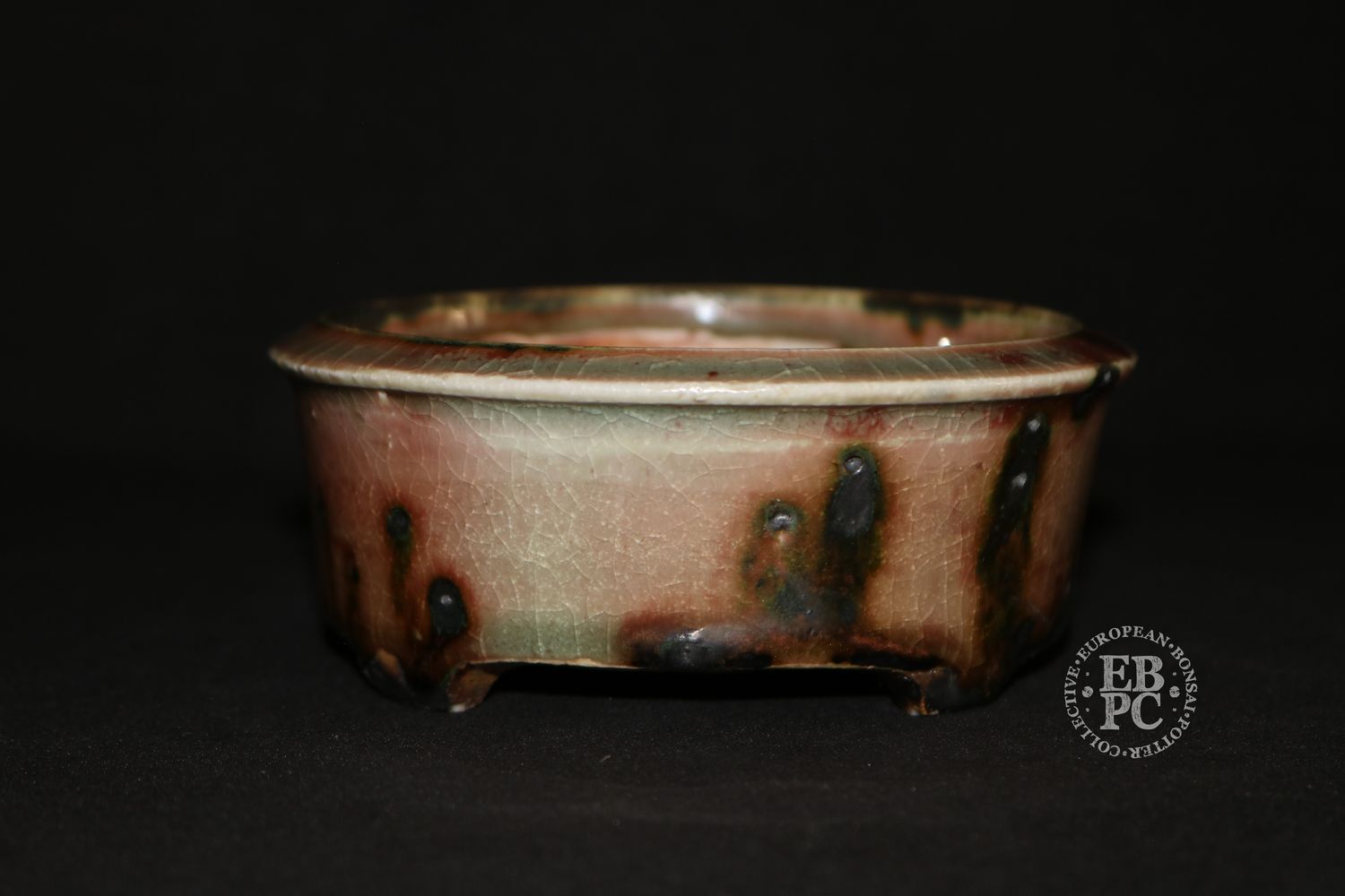 Eddie Curtis, England.   - 12.3cm; Hand-thrown; Round;  Exceptional Salmon Pink &amp; Celadon Glaze; Scorched Features; Blood-Red; Crackle Effect; Stamped with Artist&#39;s Logo.